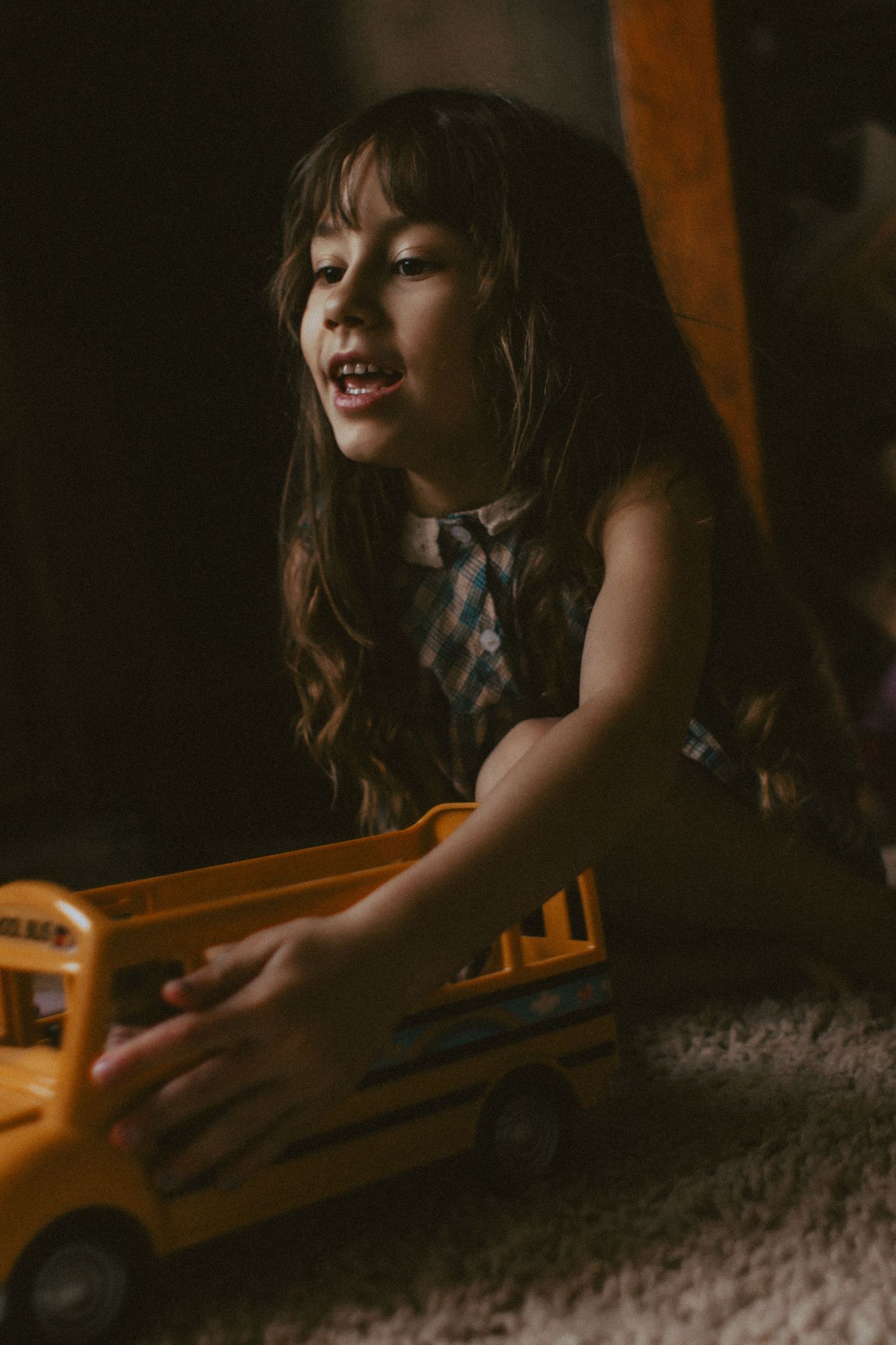 A young girl playing with Calico Critters in her room, MN lifestyle session warmth indoor photography Elk River, MN Photographer Photography