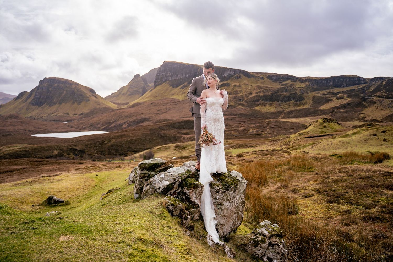 Bride and groom at The Quiraing, Isle of Skye, wedding photo capturing natural, romantic, and emotional moments.