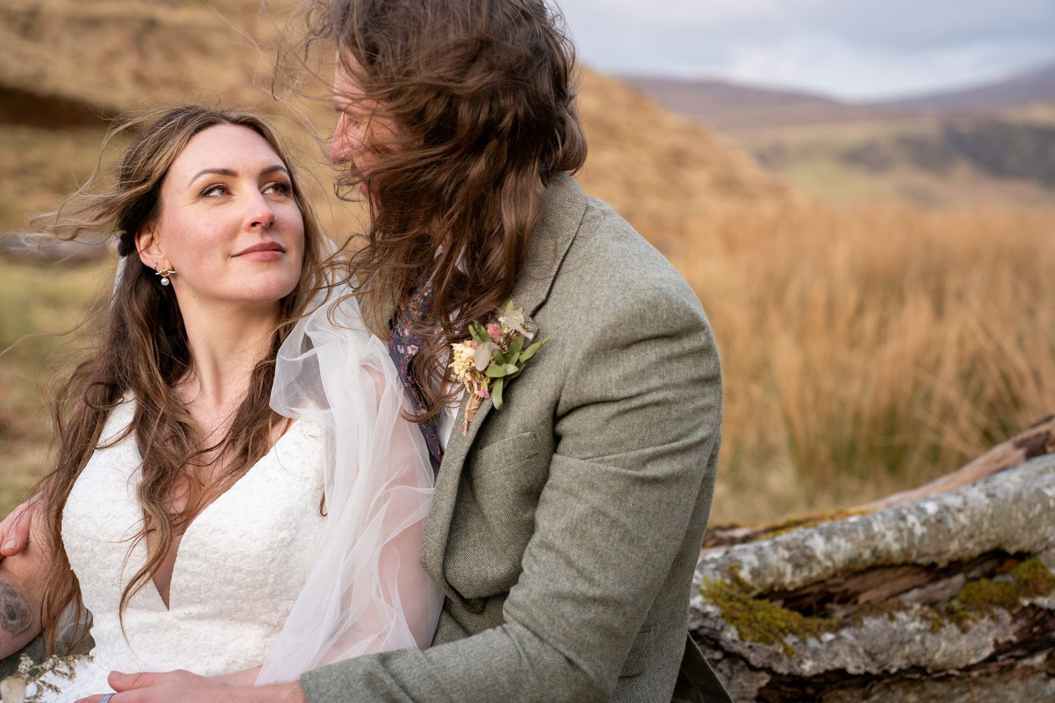Couple embracing on at Fariy Geln, Isle of Skye, Elopement photographer Scotland