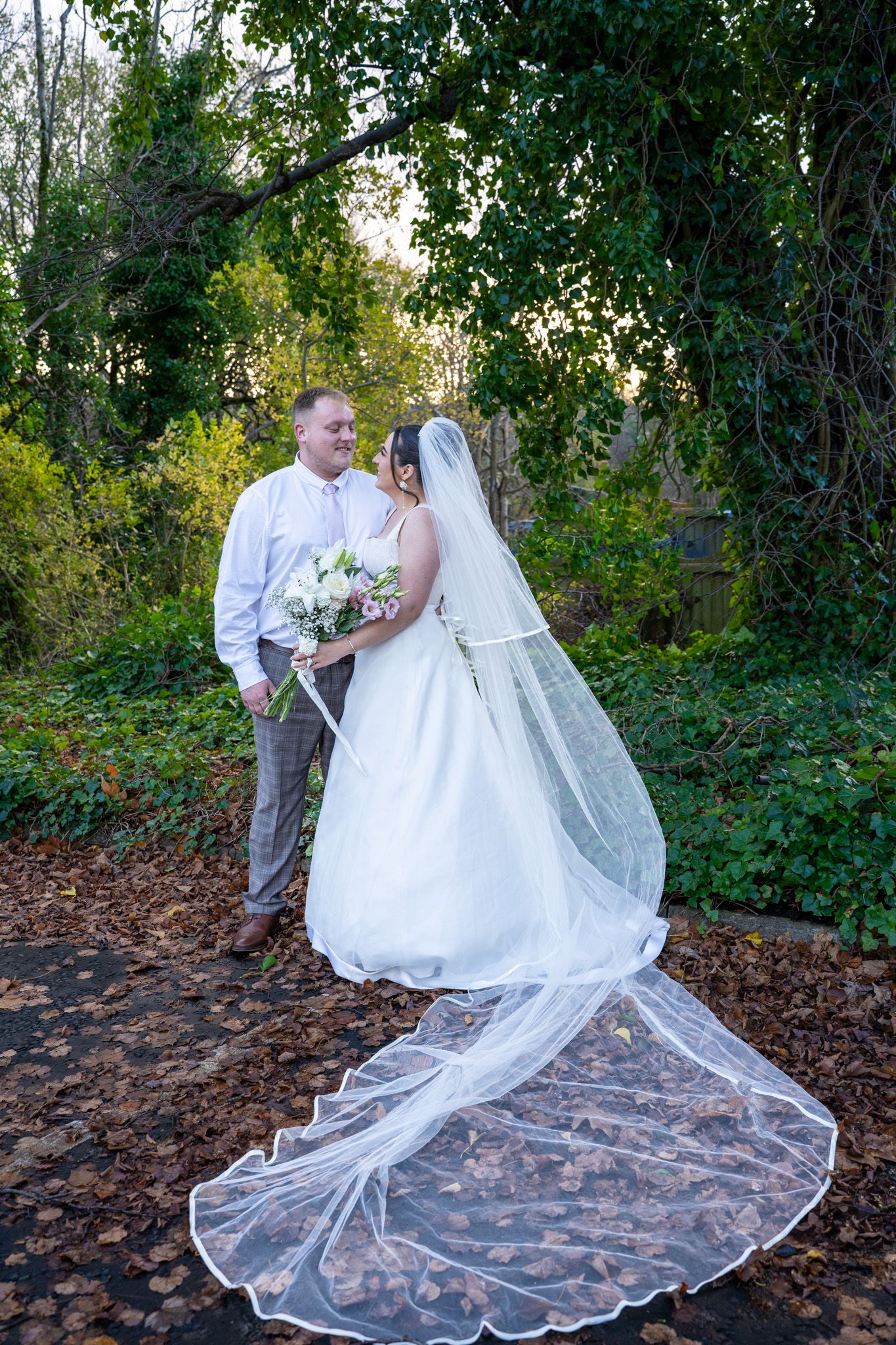 Bride and groom outdoor photo at Airdrie wedding, natural and emotional photography capturing authentic love and joyful moments