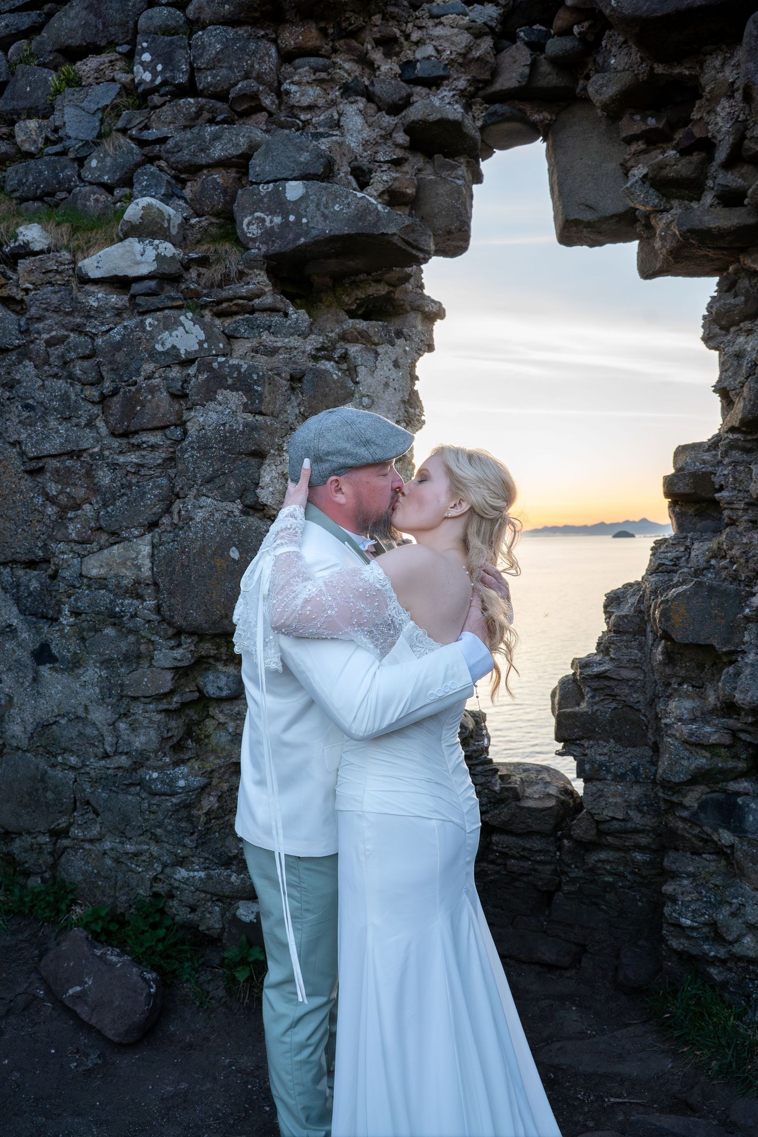 Bride and groom on wedding day, coastal elopement in Scotland