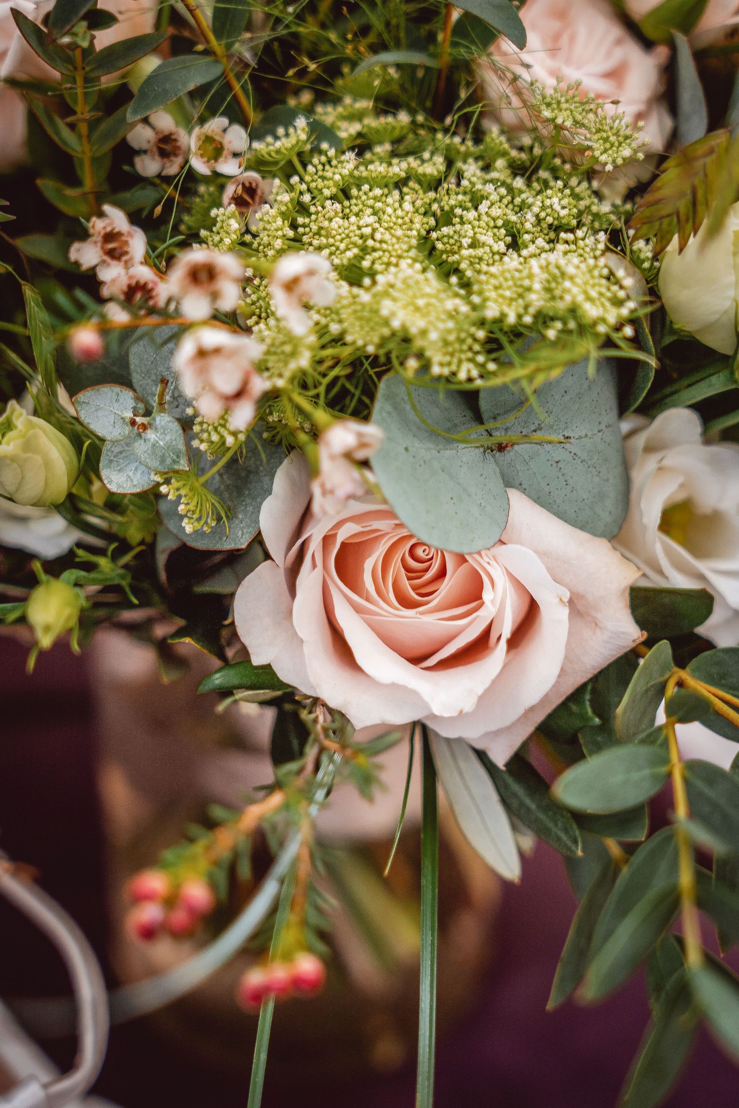 Close up of Flower Bouquet with Pink Rose and Pink Waxflowers