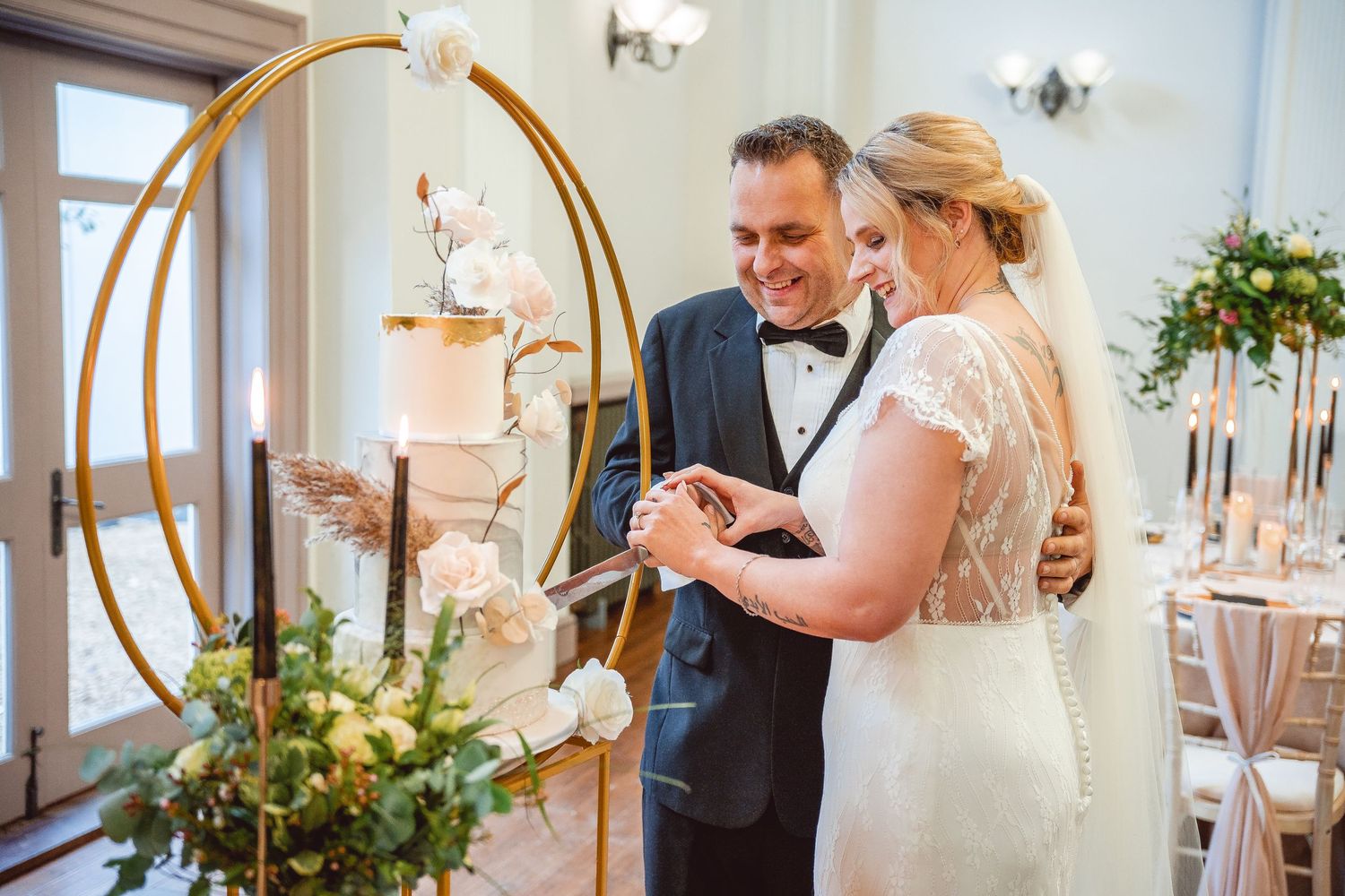 Bride and Groom cutting the cake