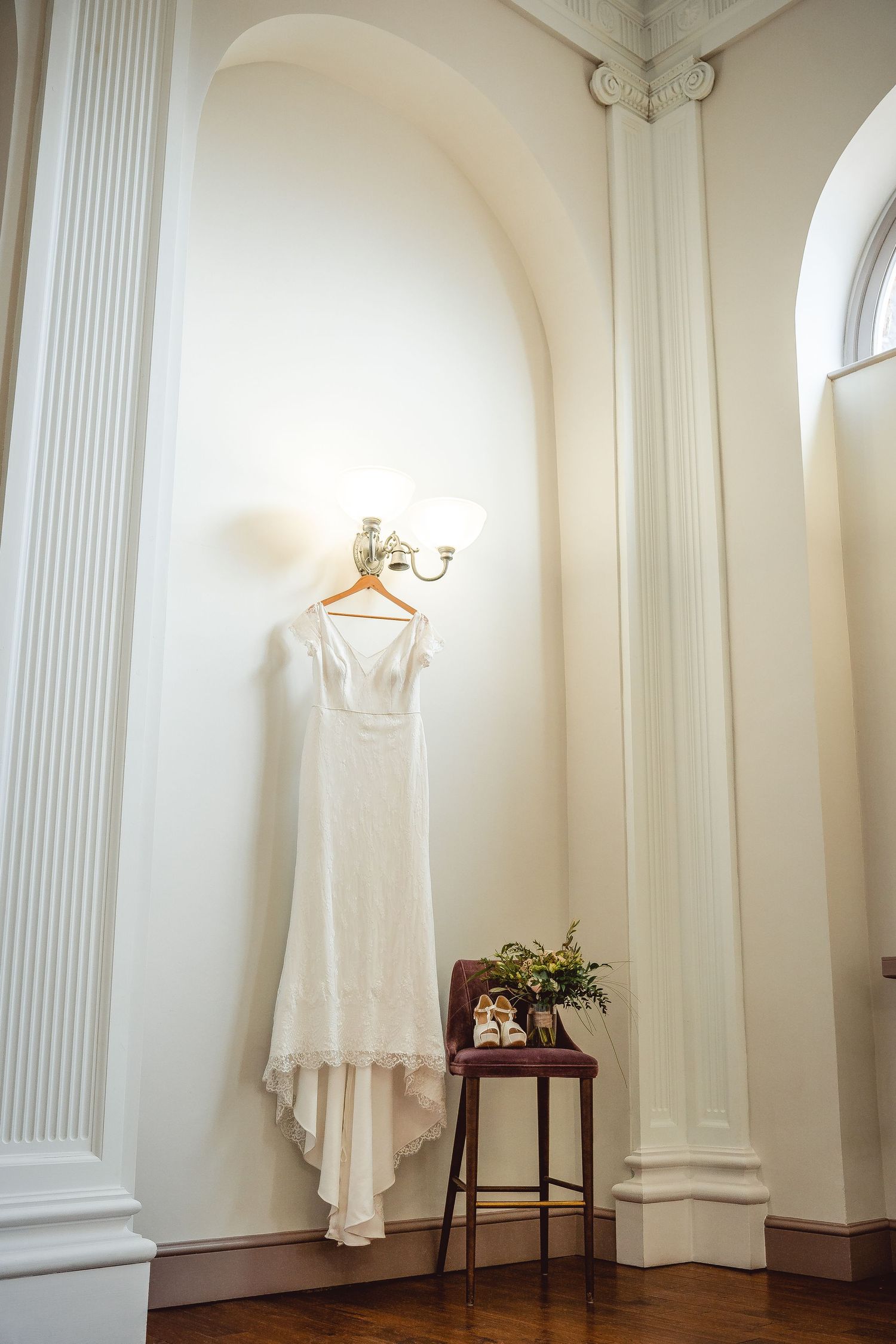 Hanging lace ivory wedding dress