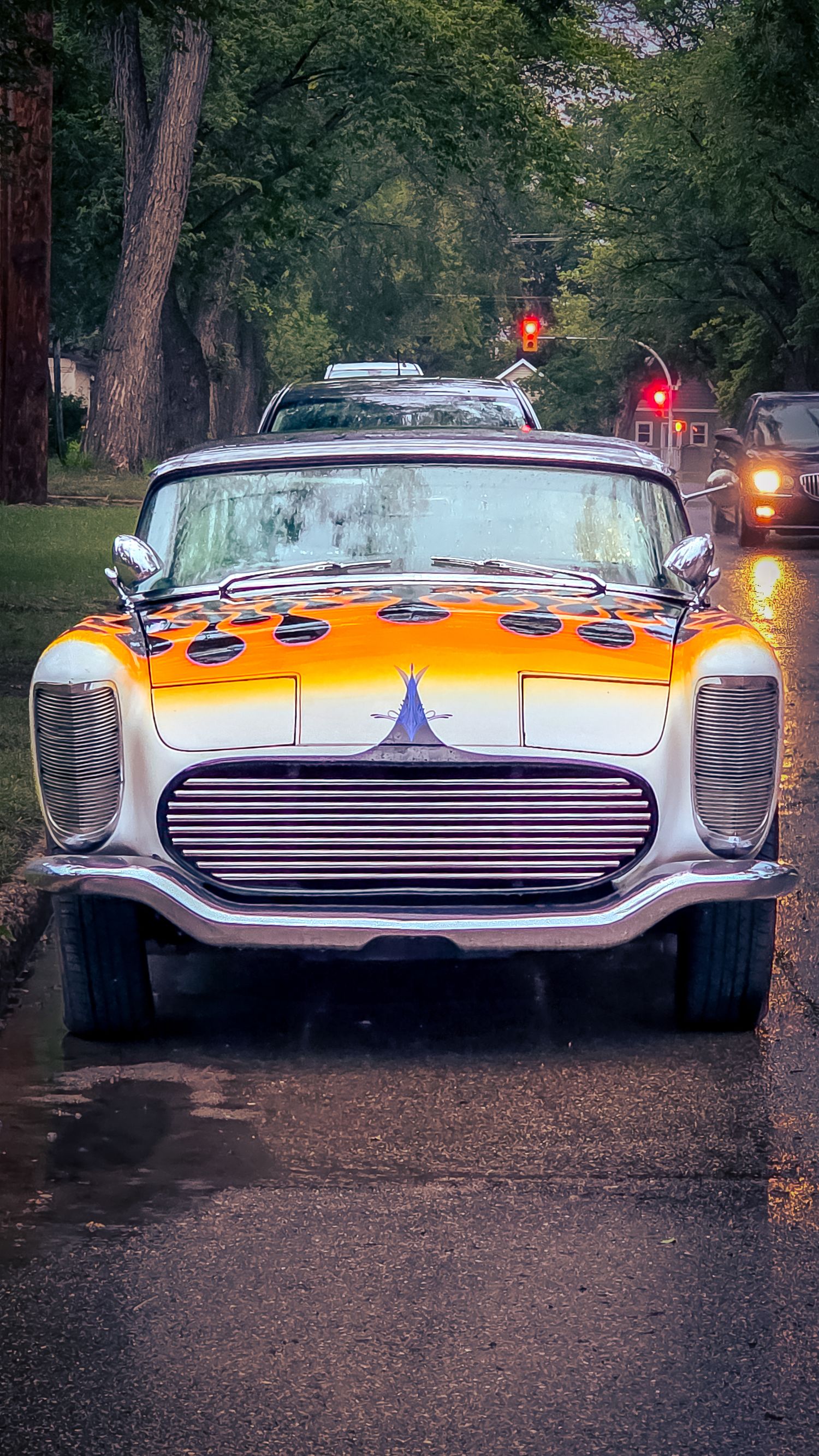 Automotive photography detail of multi colored flame car captured in Saskatoon Saskatchewan