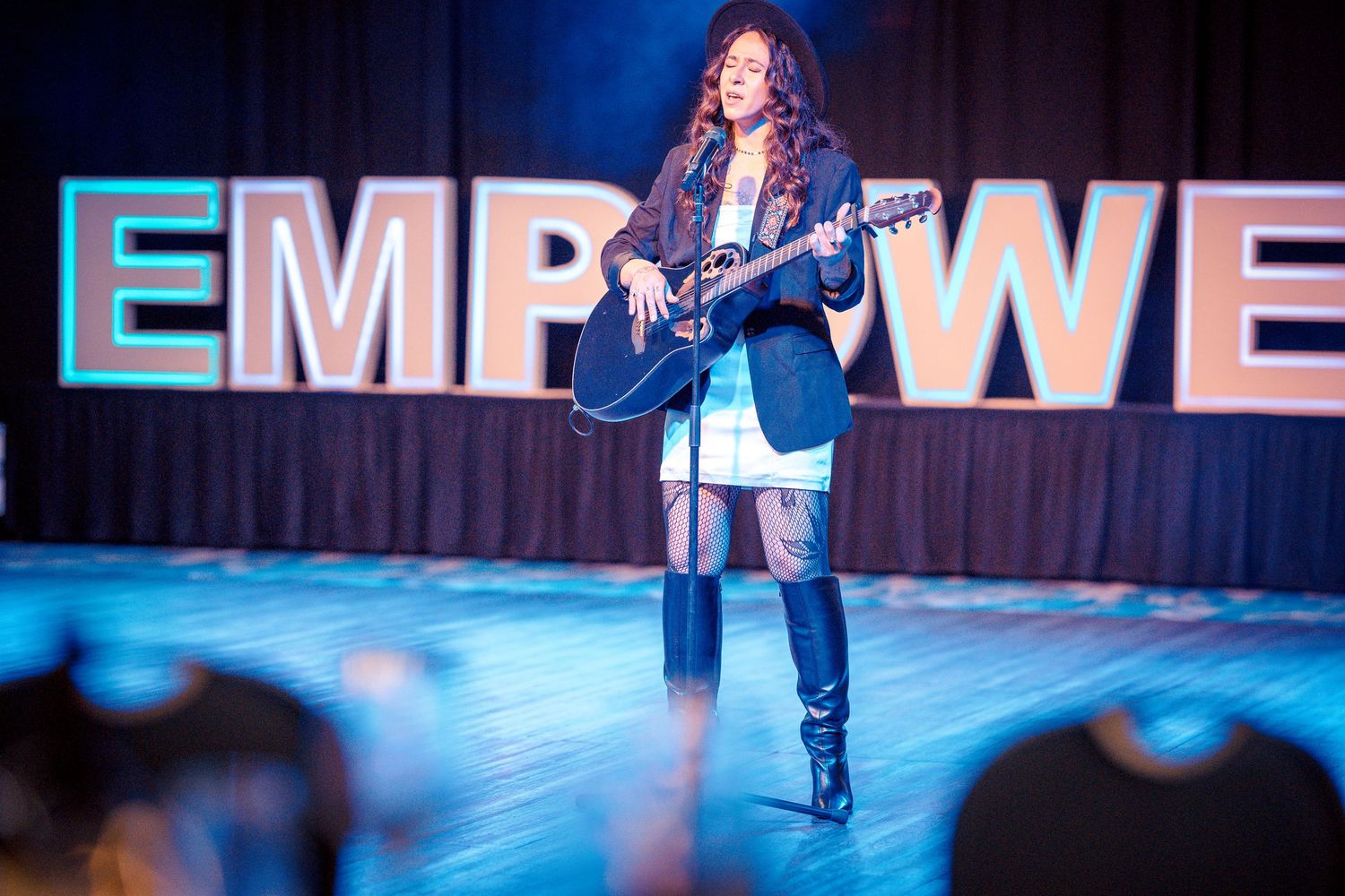 Singer at EMPOWER Peace at Home Event