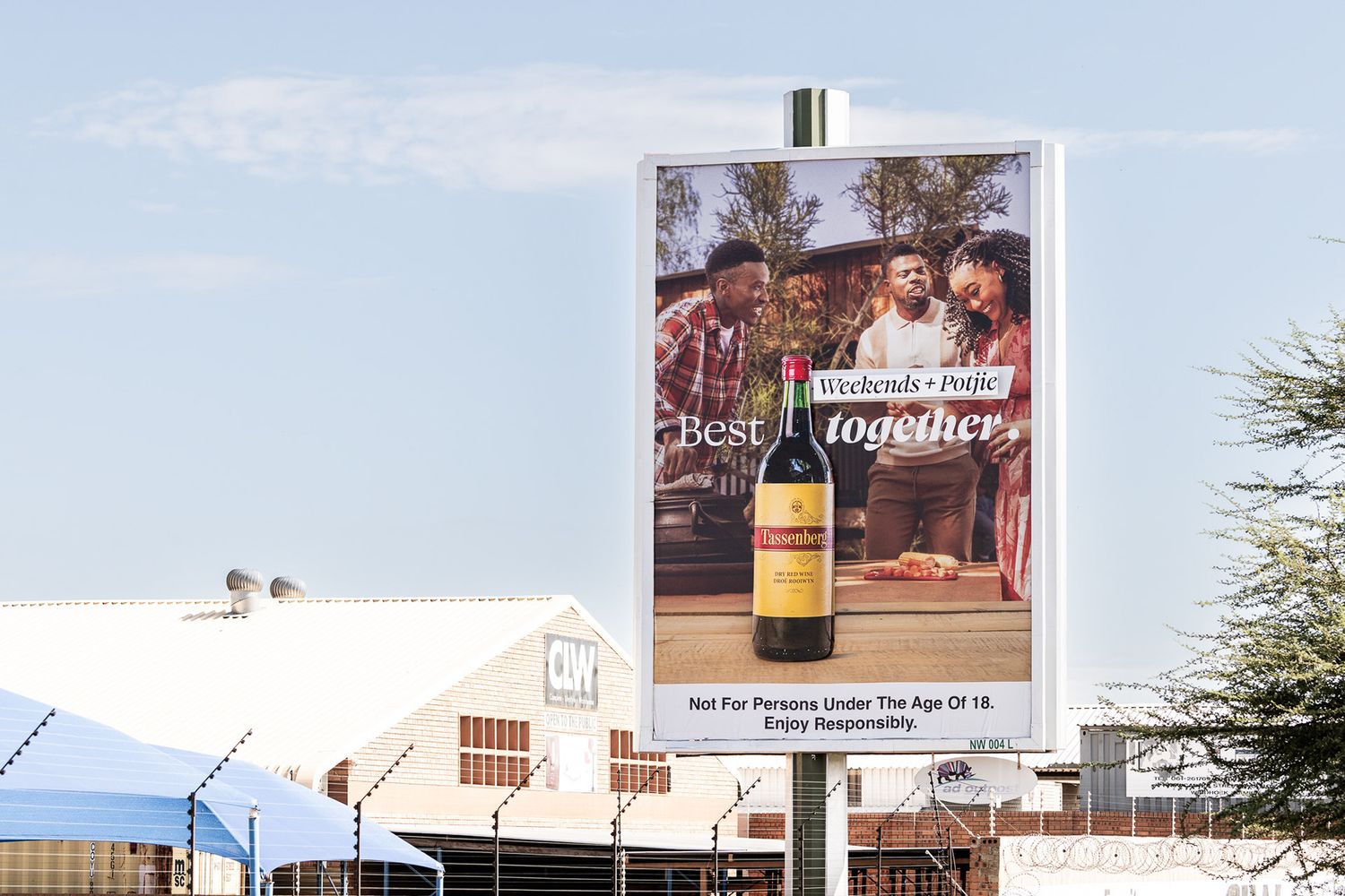 Billboard advertisement for wine featuring the slogan Best Together above a bottle, with a responsible drinking notice.