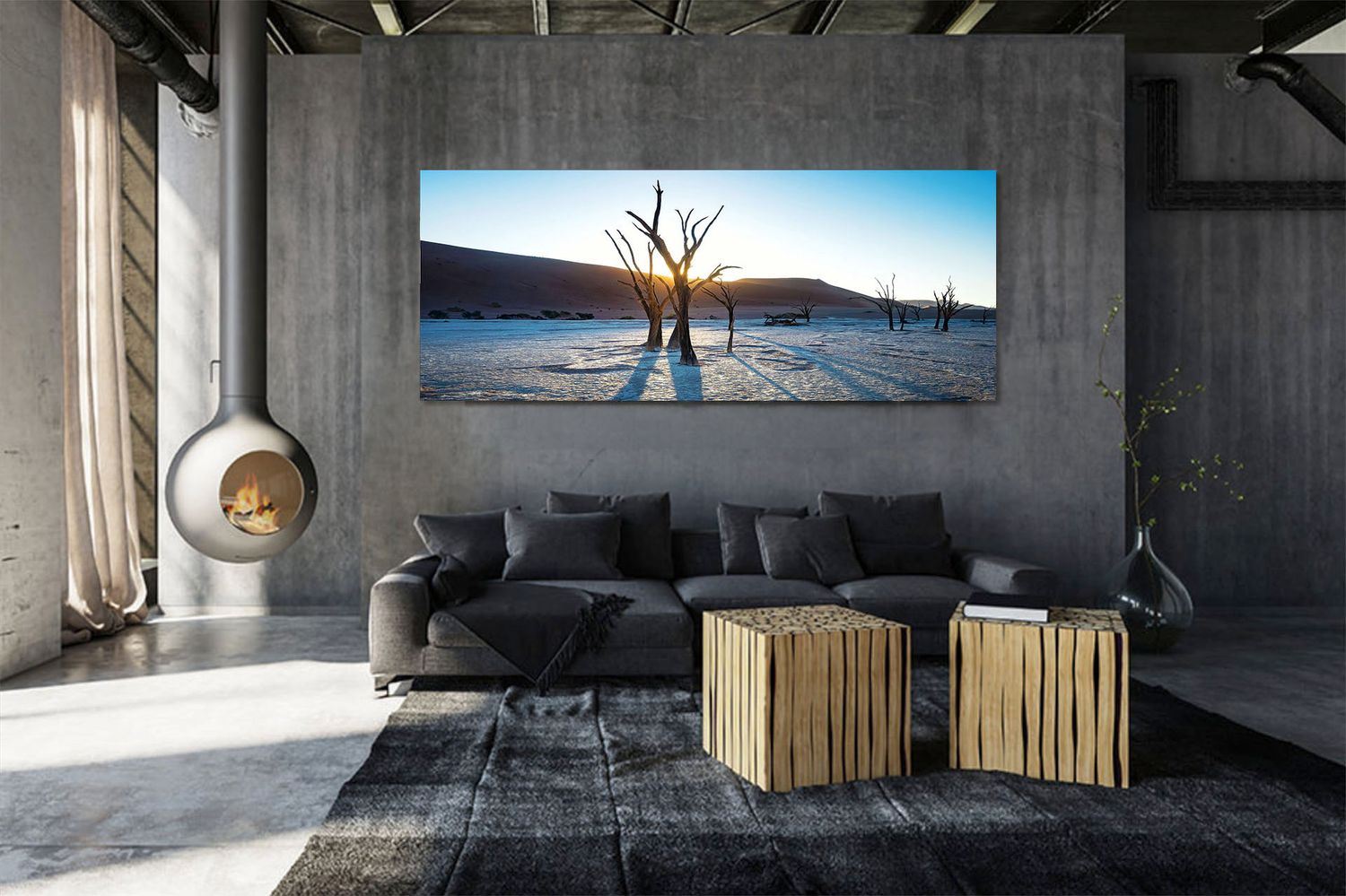 Modern living room with large panoramic wall art of dead trees at sunset in Deadvlei, Namibia.