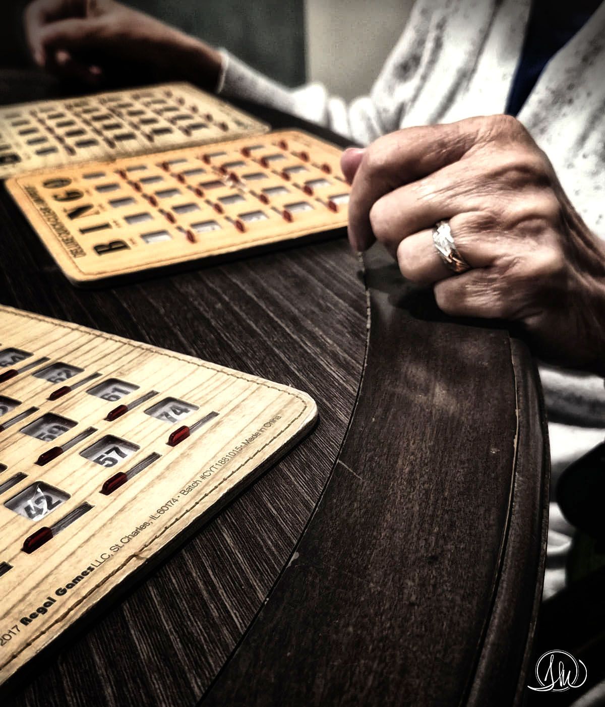 Elderly woman's hands at a bingo table - intimate family photography Jacksonville Florida - The Present Project by Tina Minshall Photography