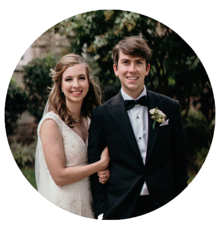 Smiling bride and groom in wedding attire posing together outdoors in a circular portrait photo.