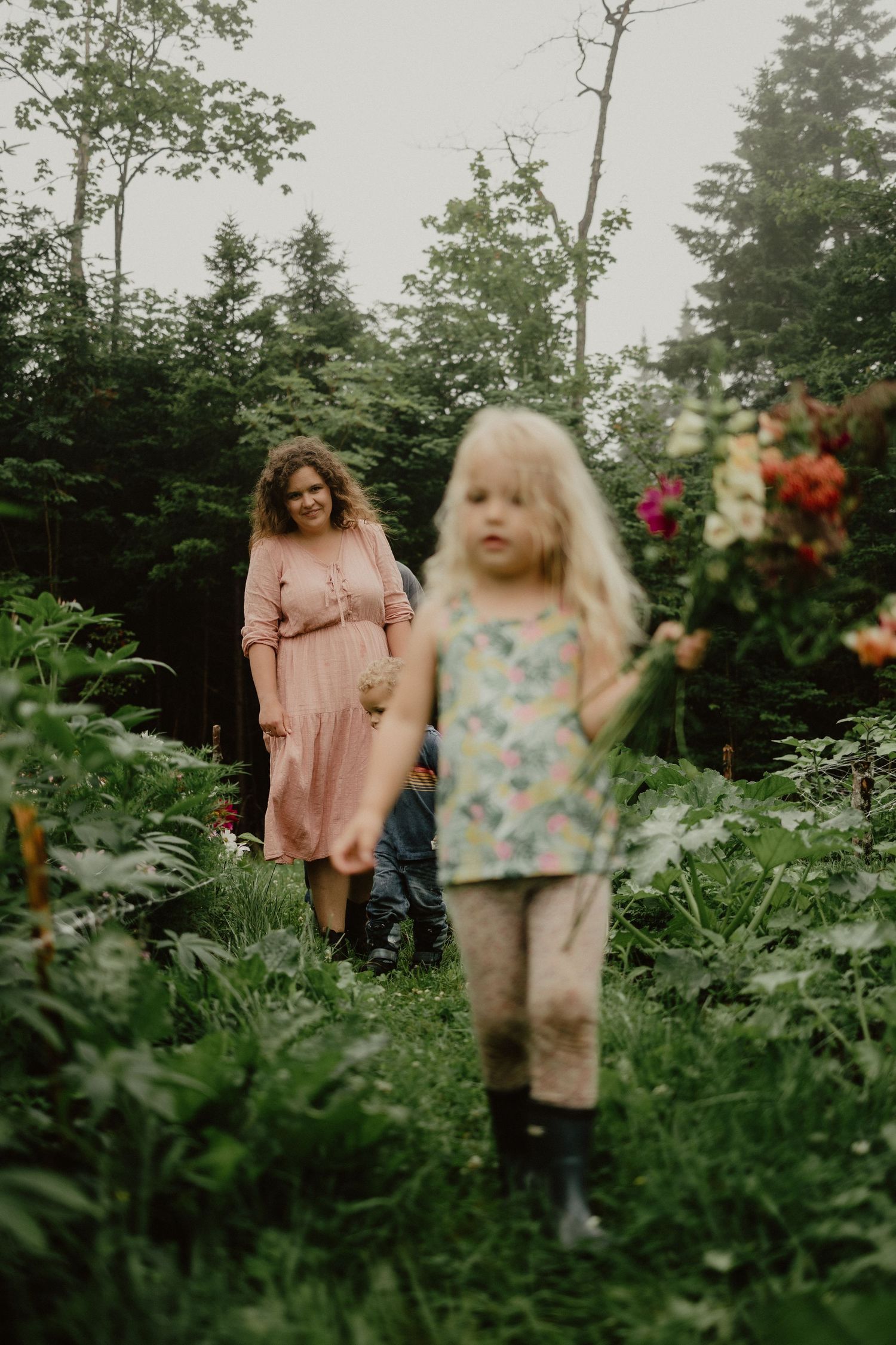 family in tiny homestead flower farm