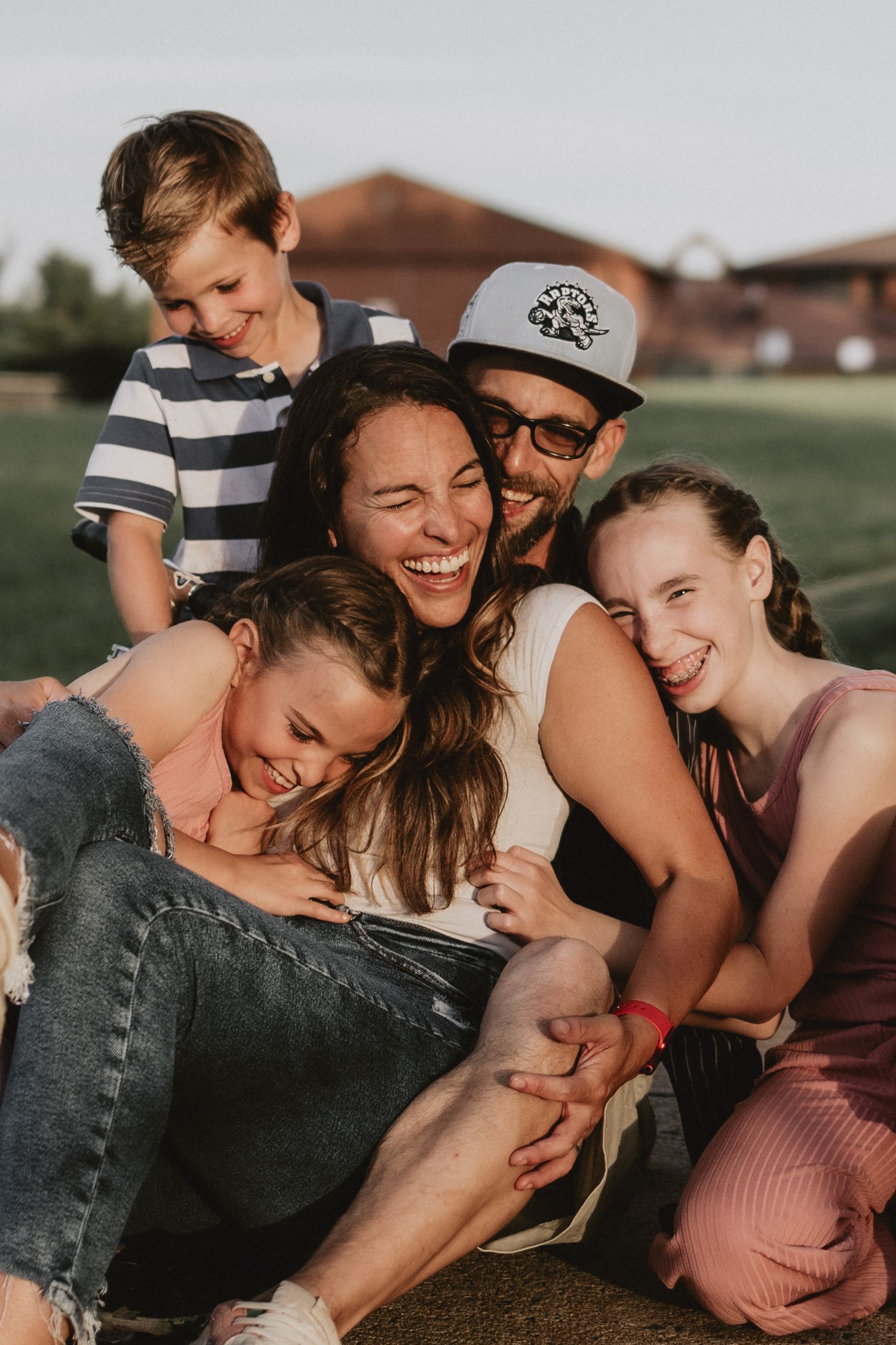 A family enjoying skateboarding together on the walking trail in Windsor Nova Scotia