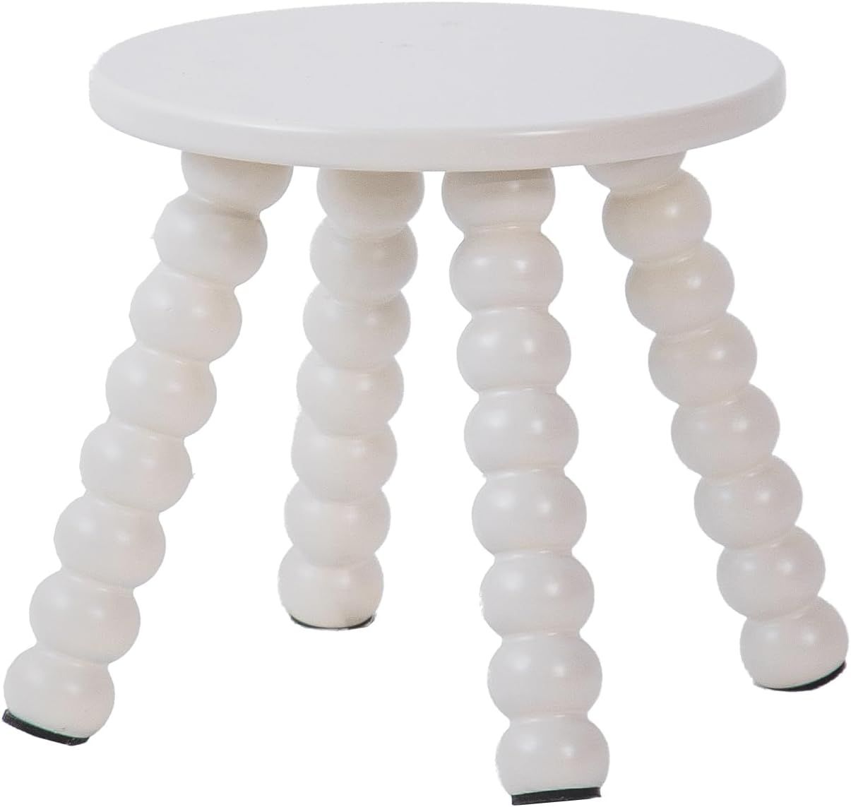 Modern white stool with four turned spindle-style legs made of stacked ball-shaped segments and a round seat top.