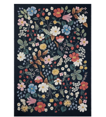 Colorful floral pattern with blue, coral, and yellow flowers on a dark navy background.