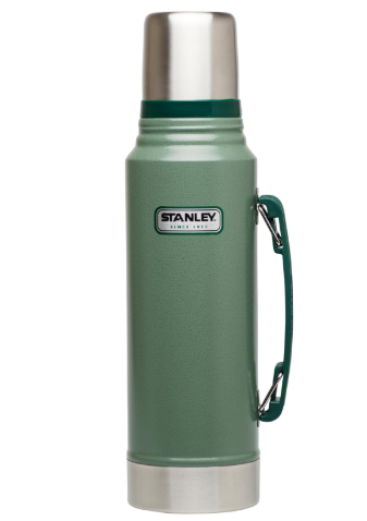 Four classic green Stanley vacuum insulated food and beverage thermoses lined up showing size progression.