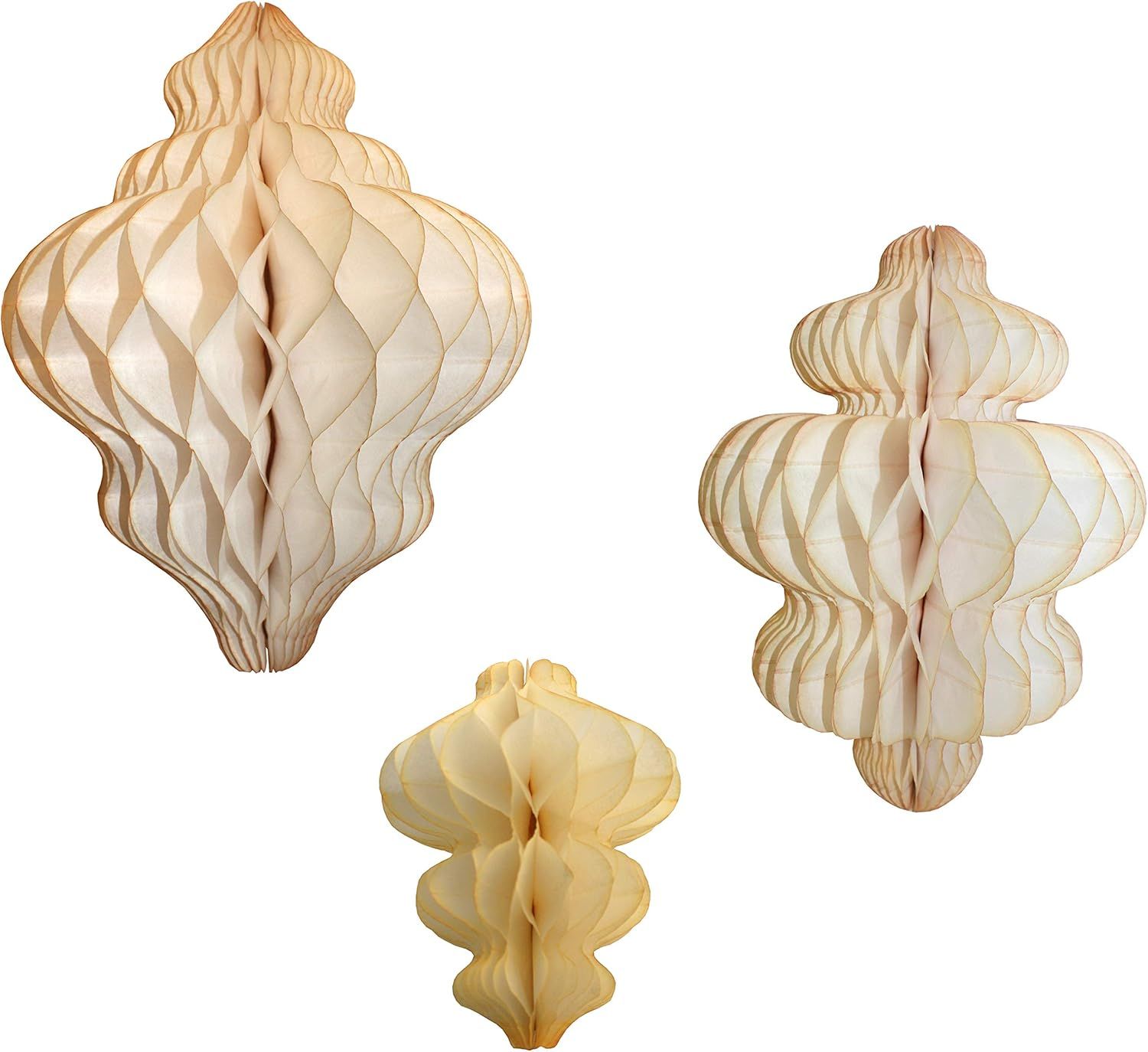 Vintage cream-colored honeycomb paper ornaments in various shapes and sizes display a delicate accordion-fold pattern.