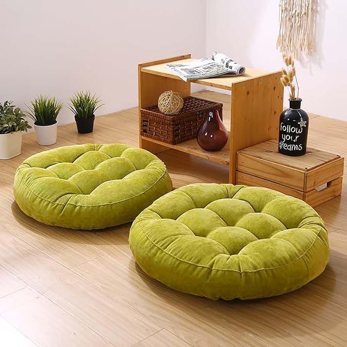 A set of round lime green floor cushions shown from different angles on wooden flooring.