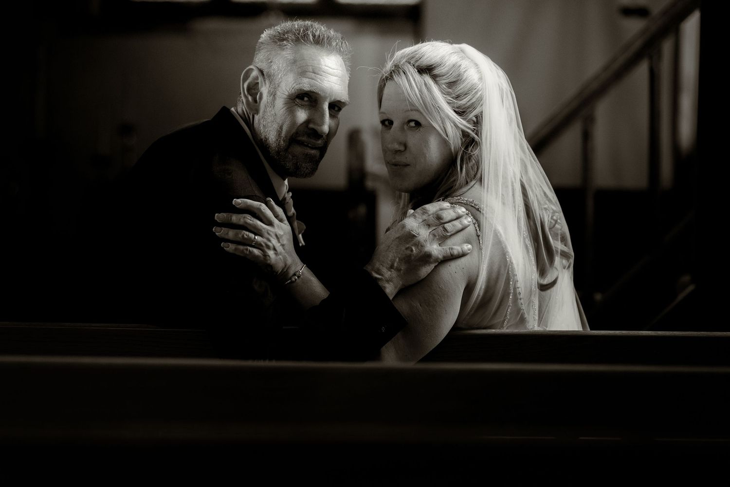 Romantic black and white wedding photography sequence capturing intimate moments.