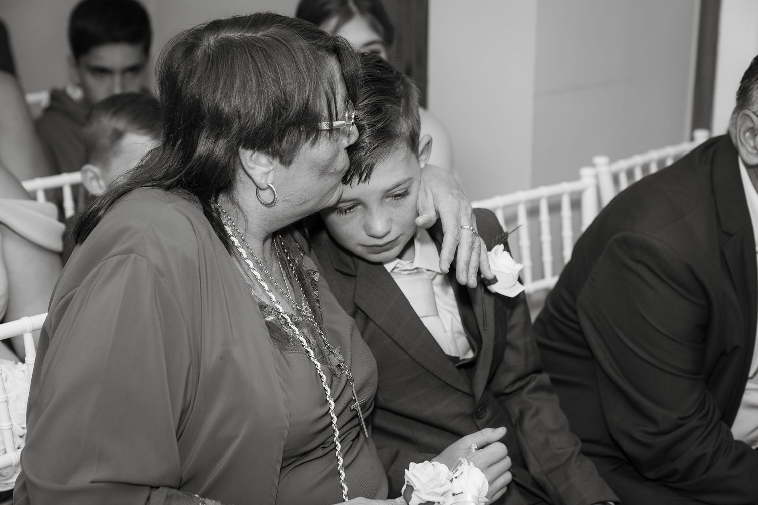 Wedding reception guests enjoying themselves during evening celebrations.