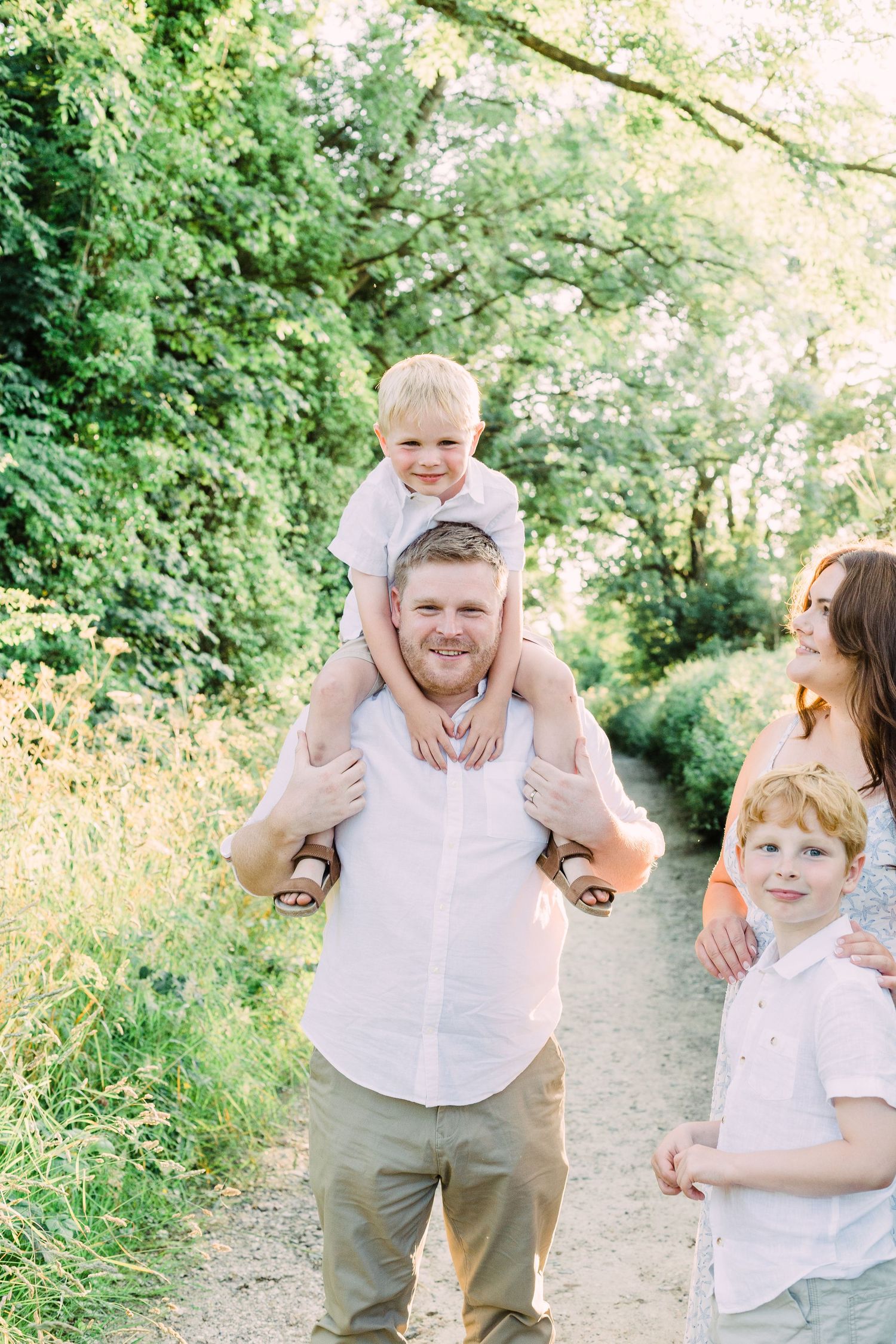 Family cuddles at sunset in the East Yorkshire countryside