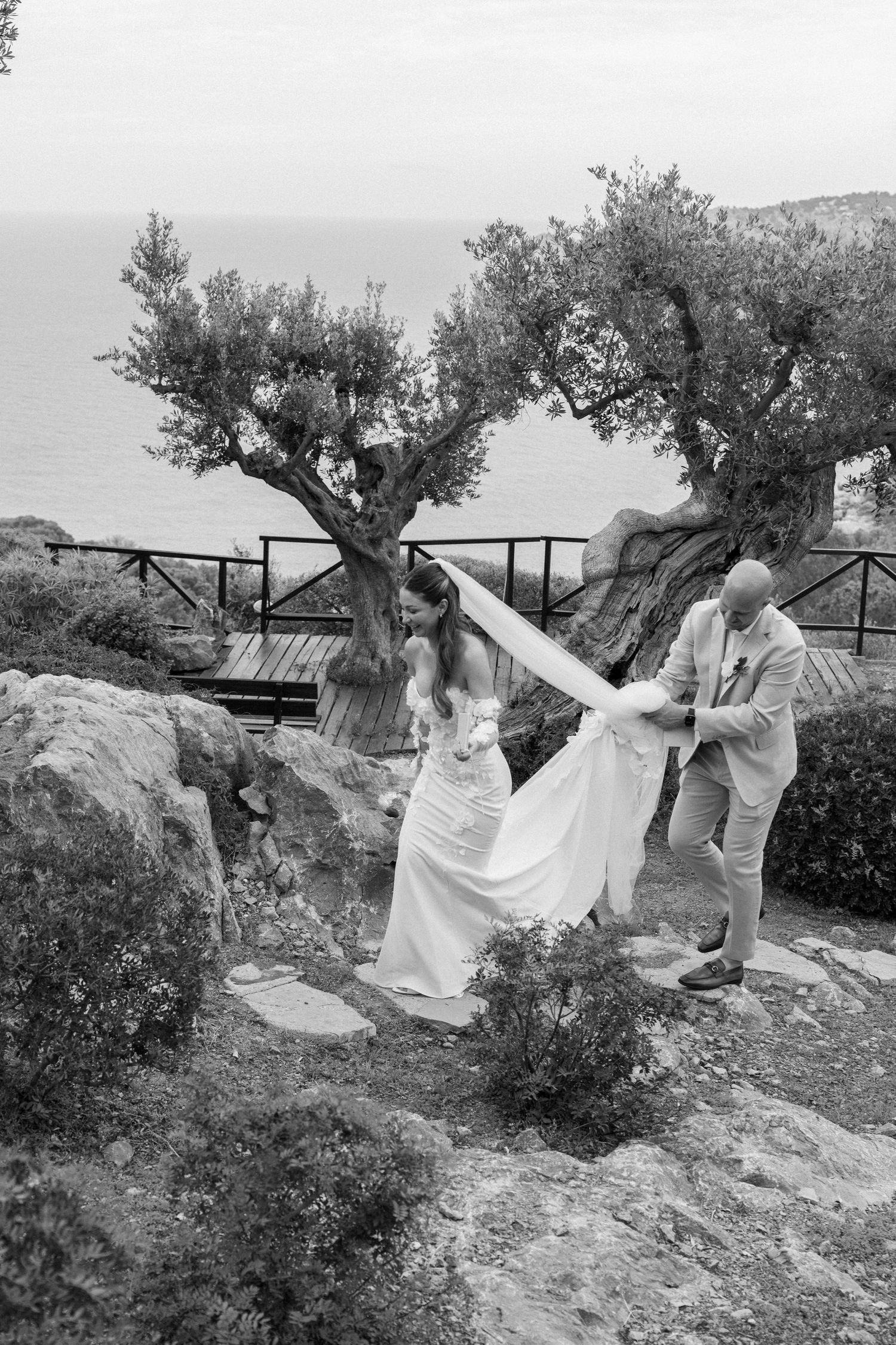Wedding photography sequence showing movement and flowing dress among Mediterranean landscape.