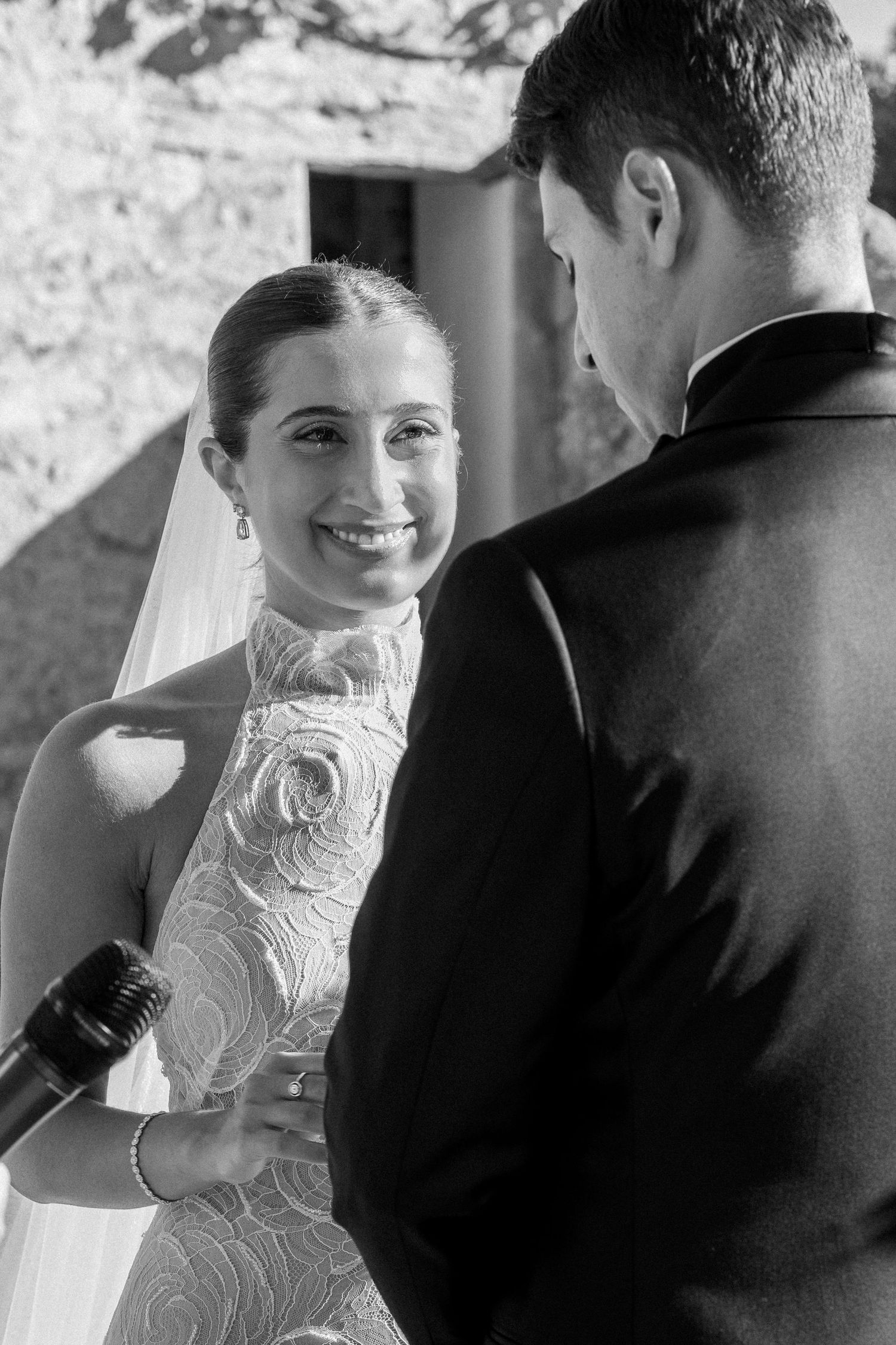 Black and white intimate wedding portraits showing joyful moments.