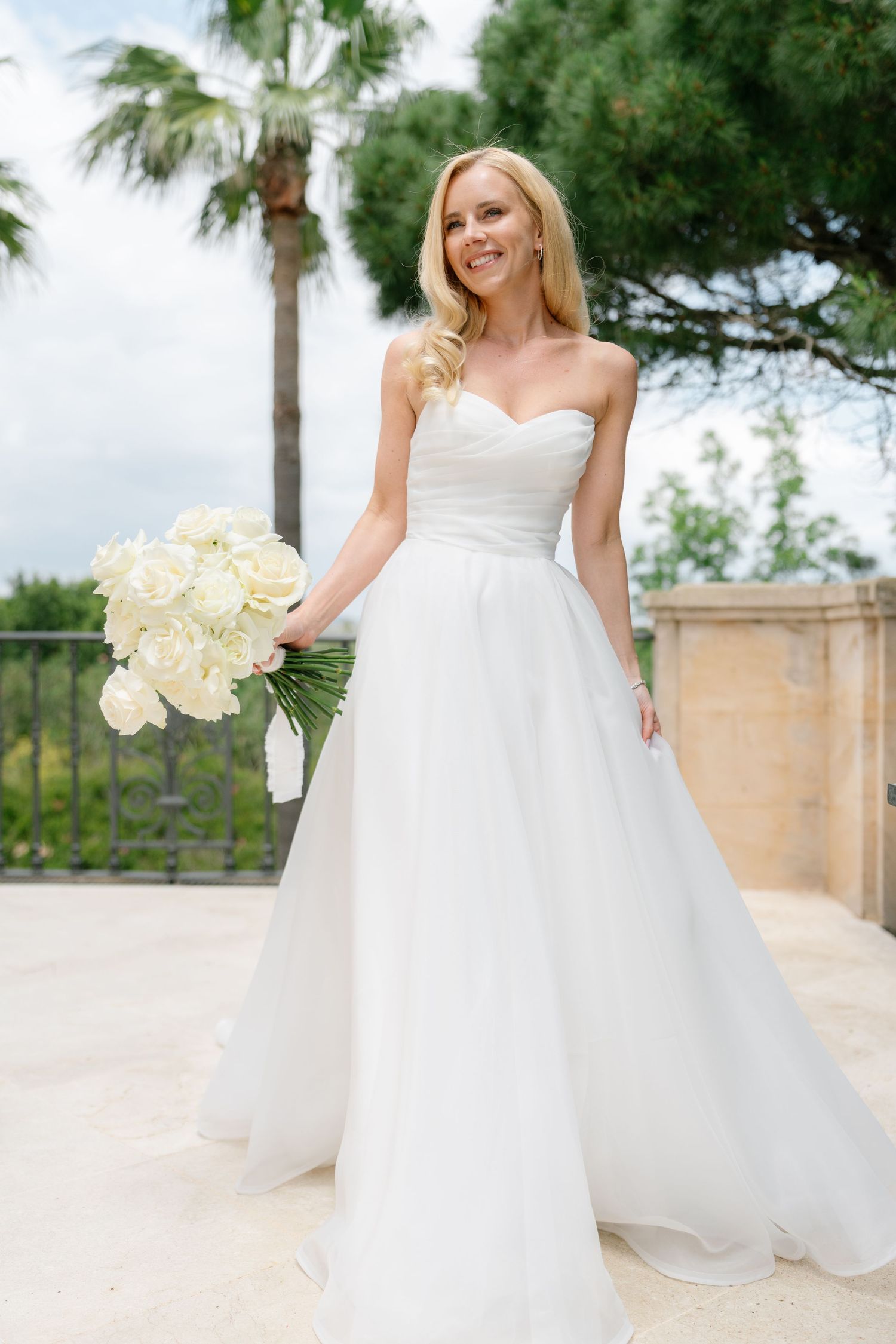 Wedding photography sequence showing bride with white orchid bouquet against tropical backdrop.