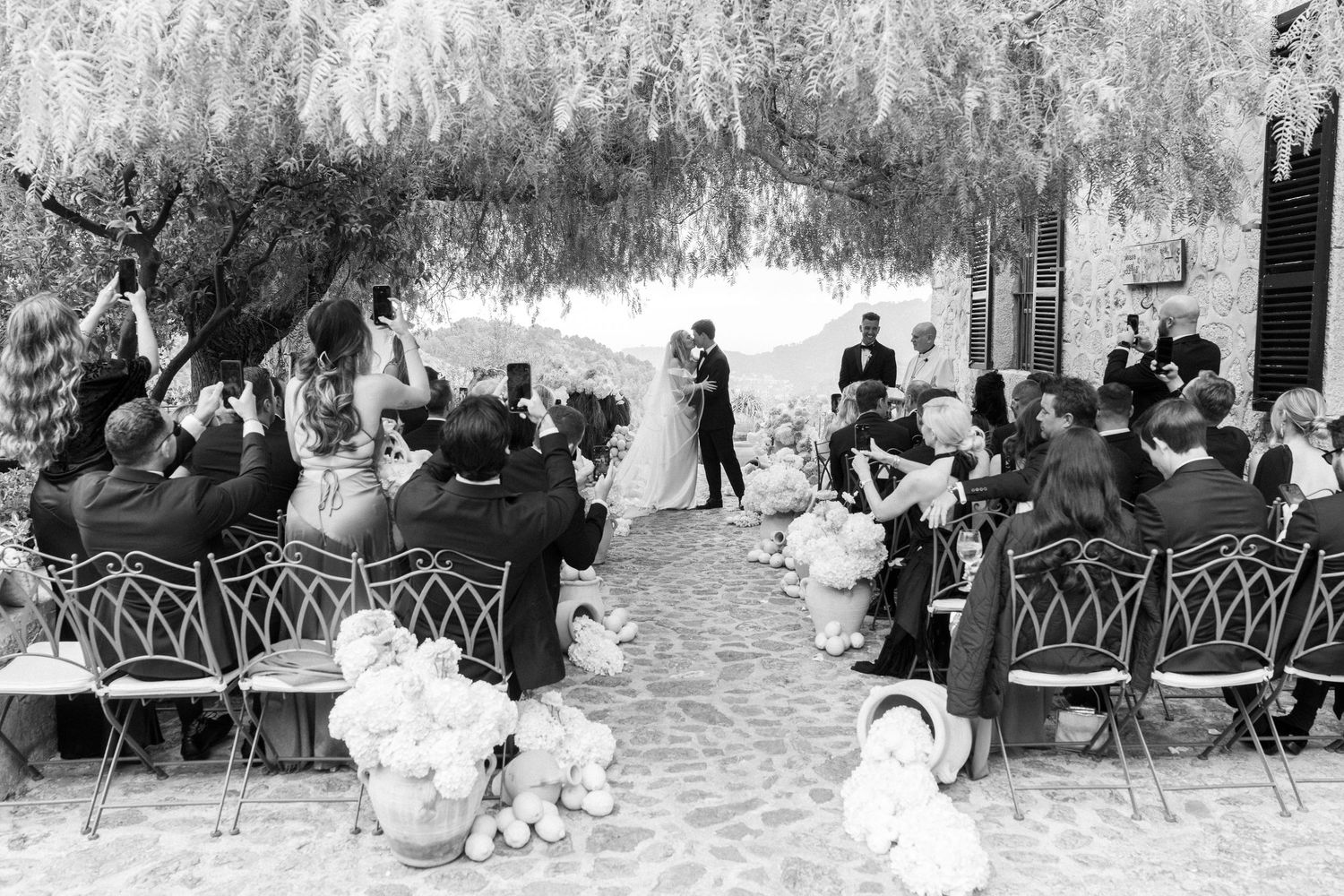 Black and white photographs show people enjoying leisure time at a park or outdoor venue.
