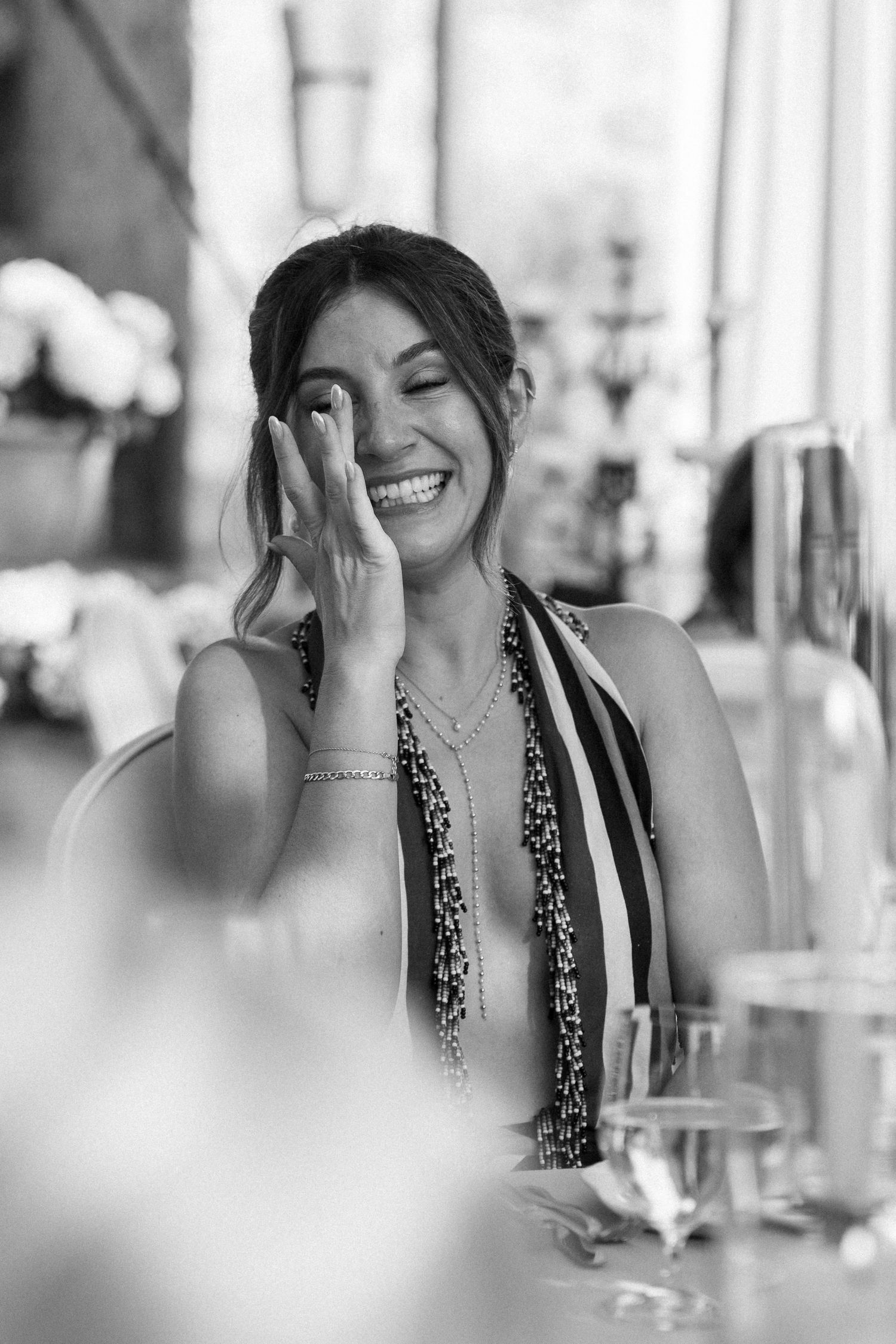 Candid moments captured during an elegant outdoor wedding reception.