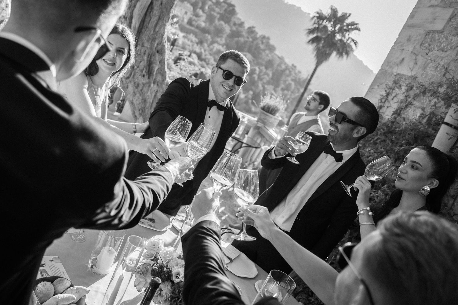 Joyful celebration moments captured during an outdoor wedding reception.