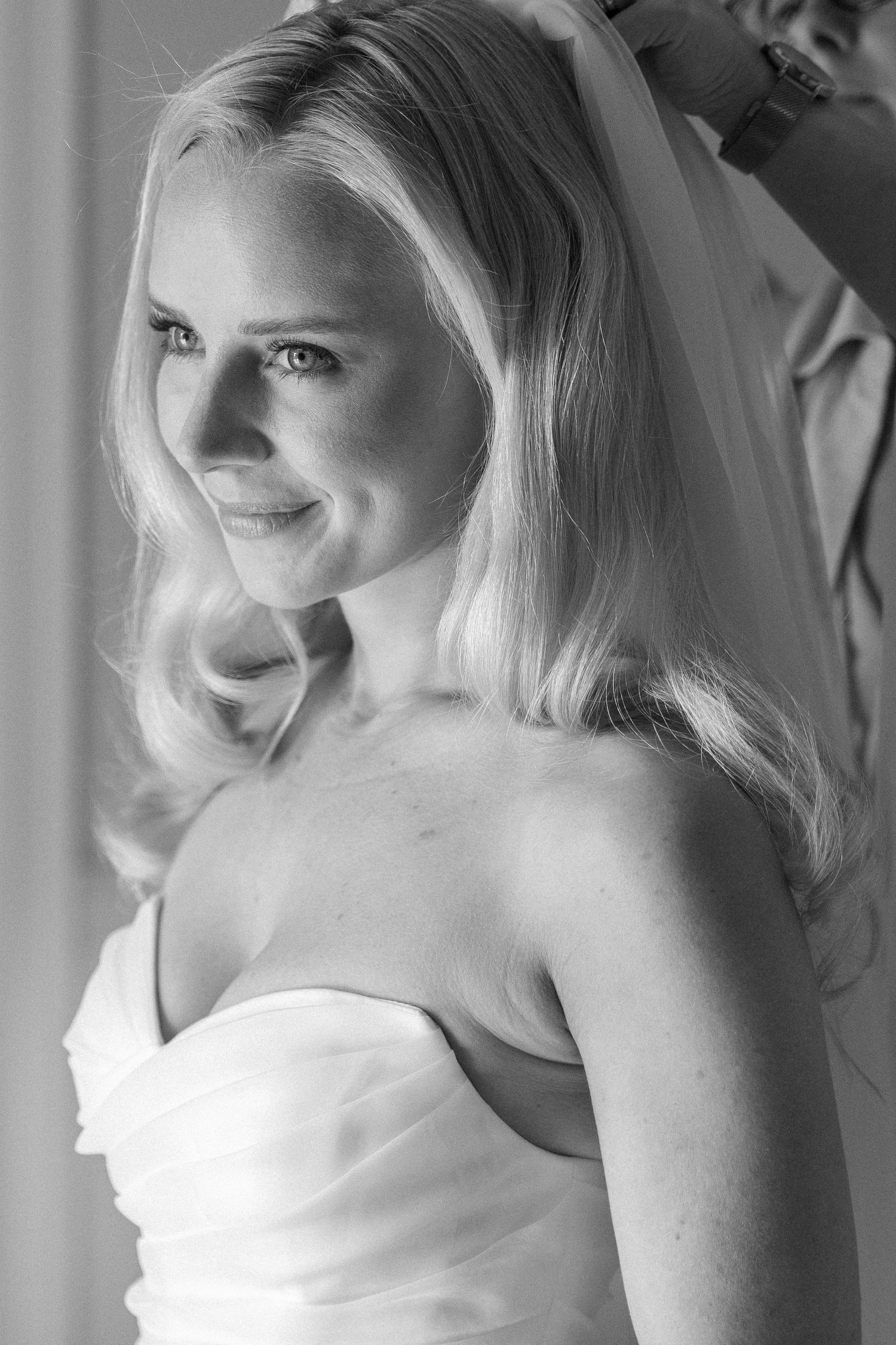 Black and white close-up portraits capturing joyful candid expressions.
