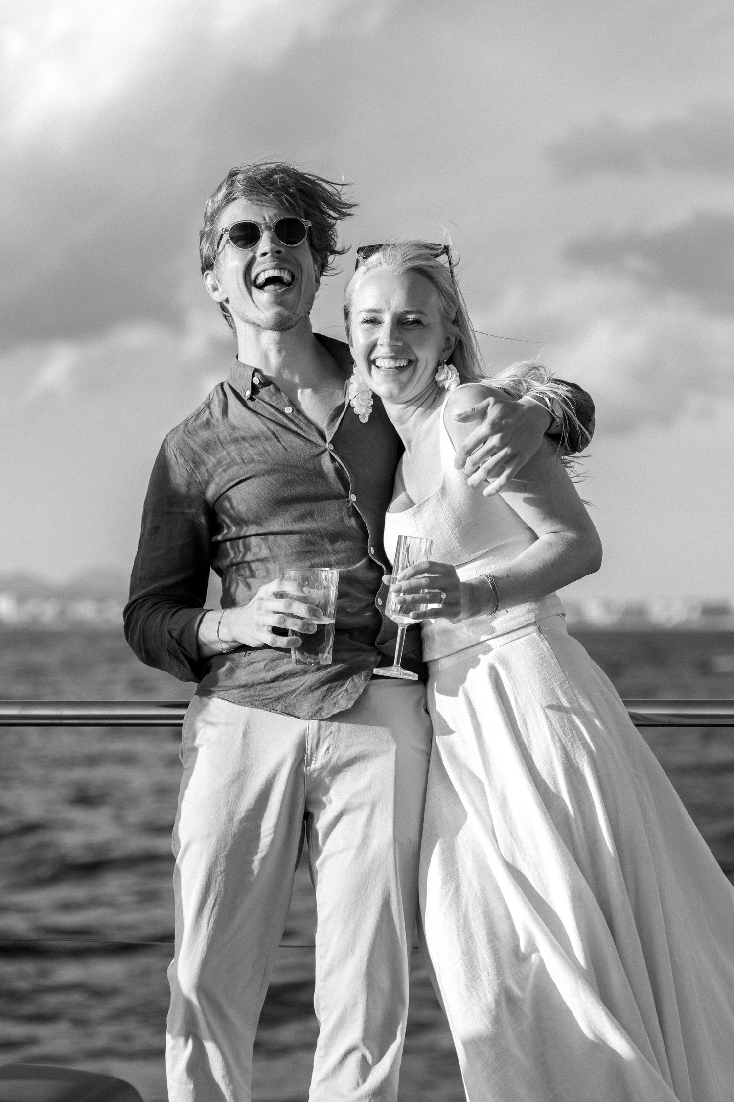 Joyful moments shared between friends during a boat celebration.