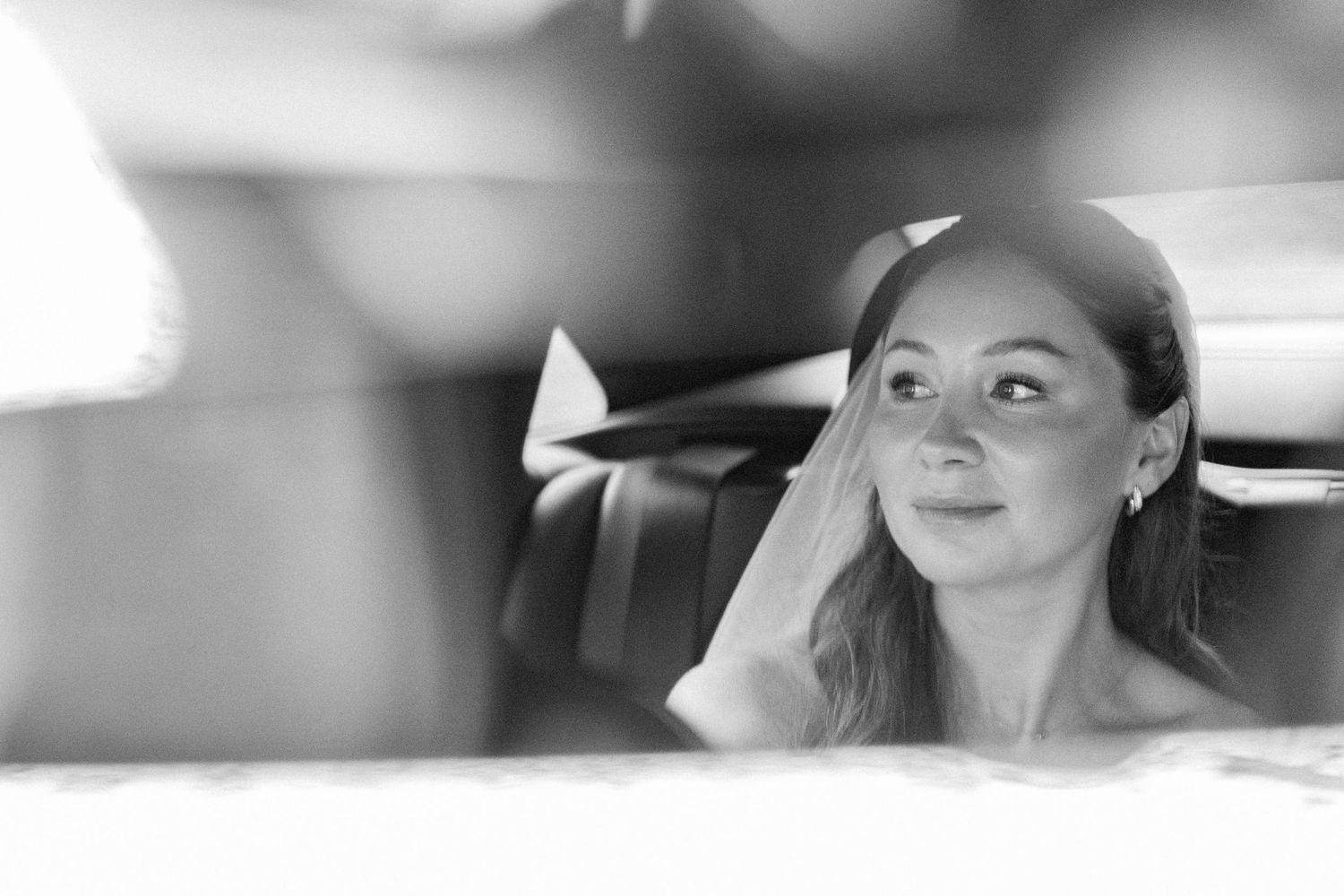 Candid black and white close-up shots capturing joyful wedding day moments.