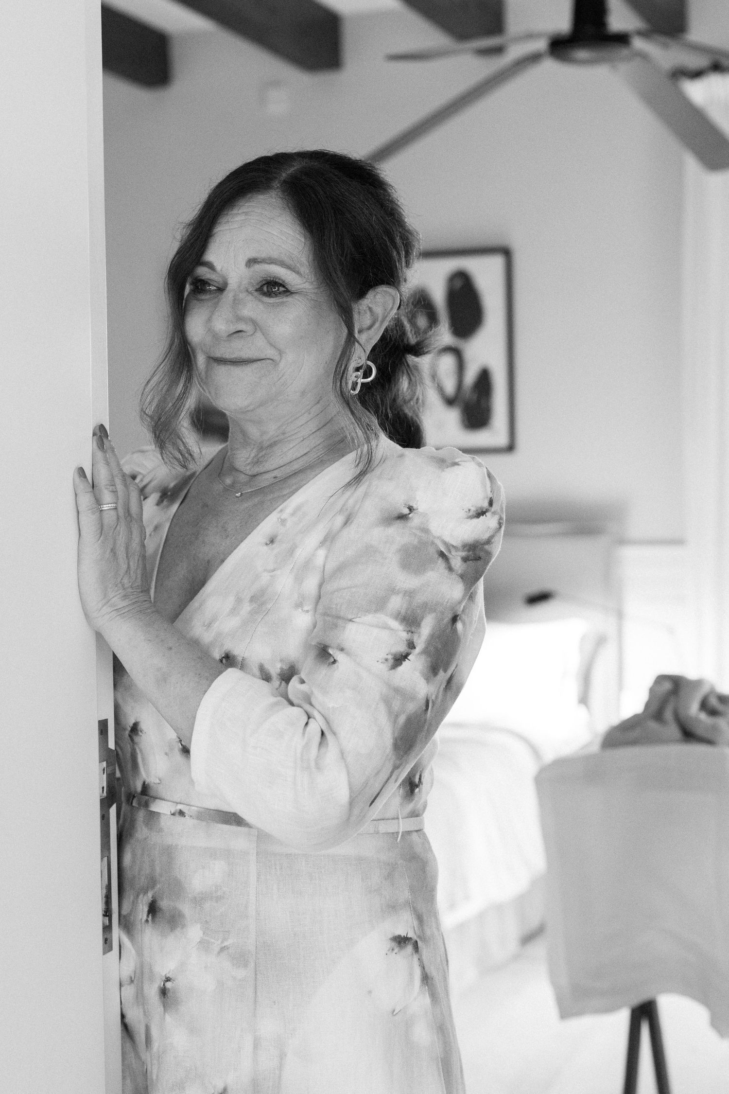 Black and white portraits showing emotional reactions and expressions during a candid moment.