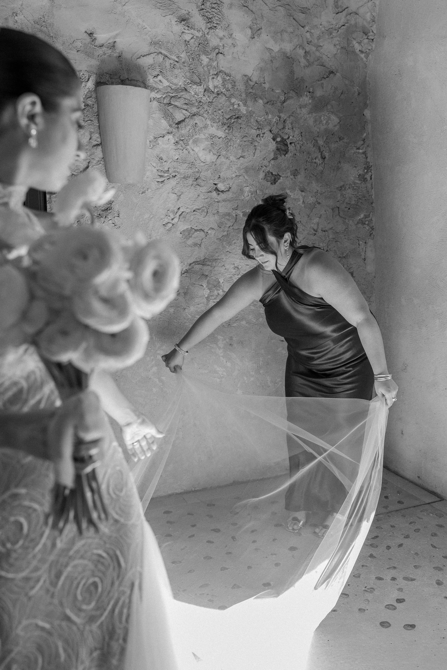 Bride in white dress twirls with bouquet in elegant sequence.