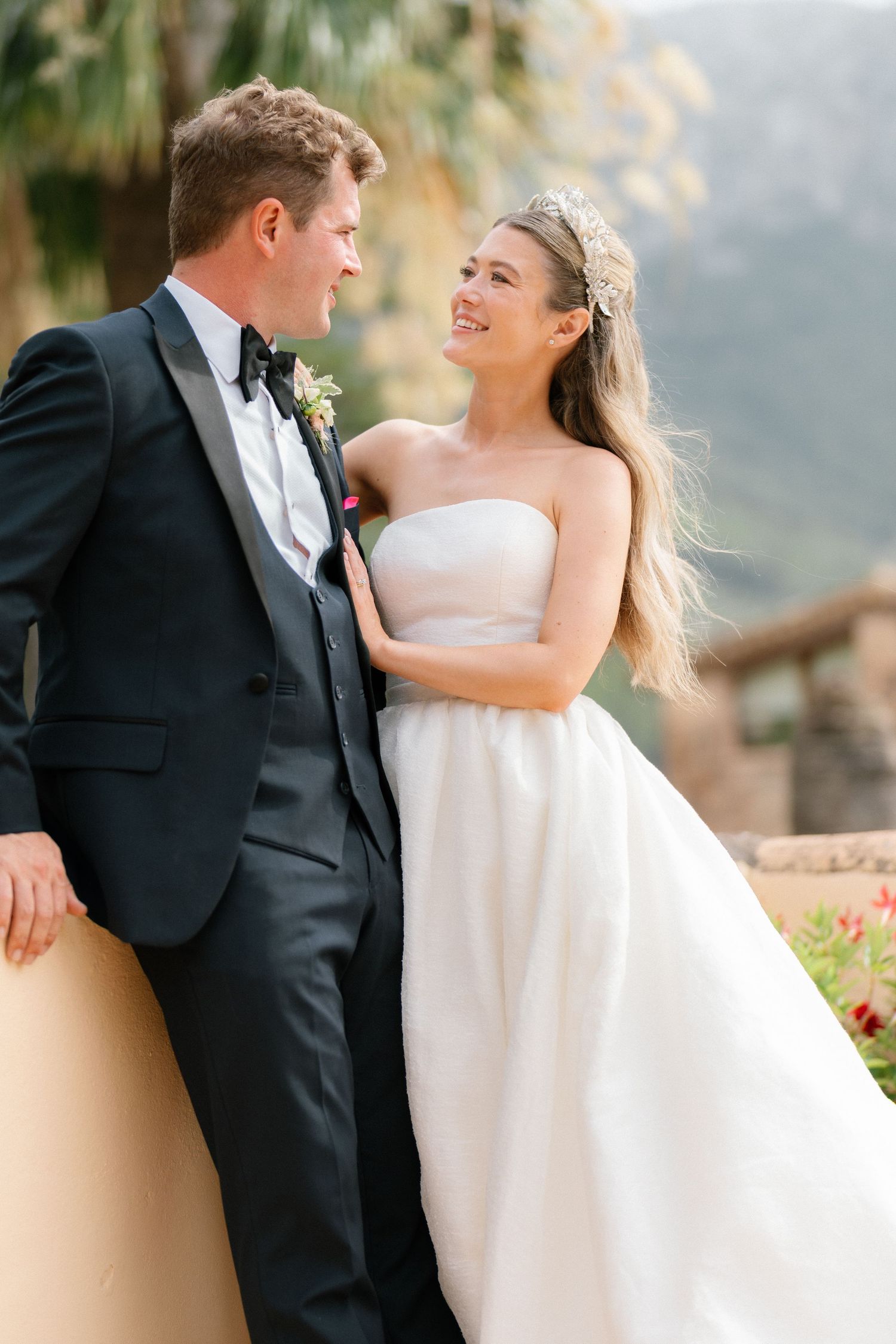 Romantic wedding couple shares intimate moments in a series of outdoor portraits at sunset.