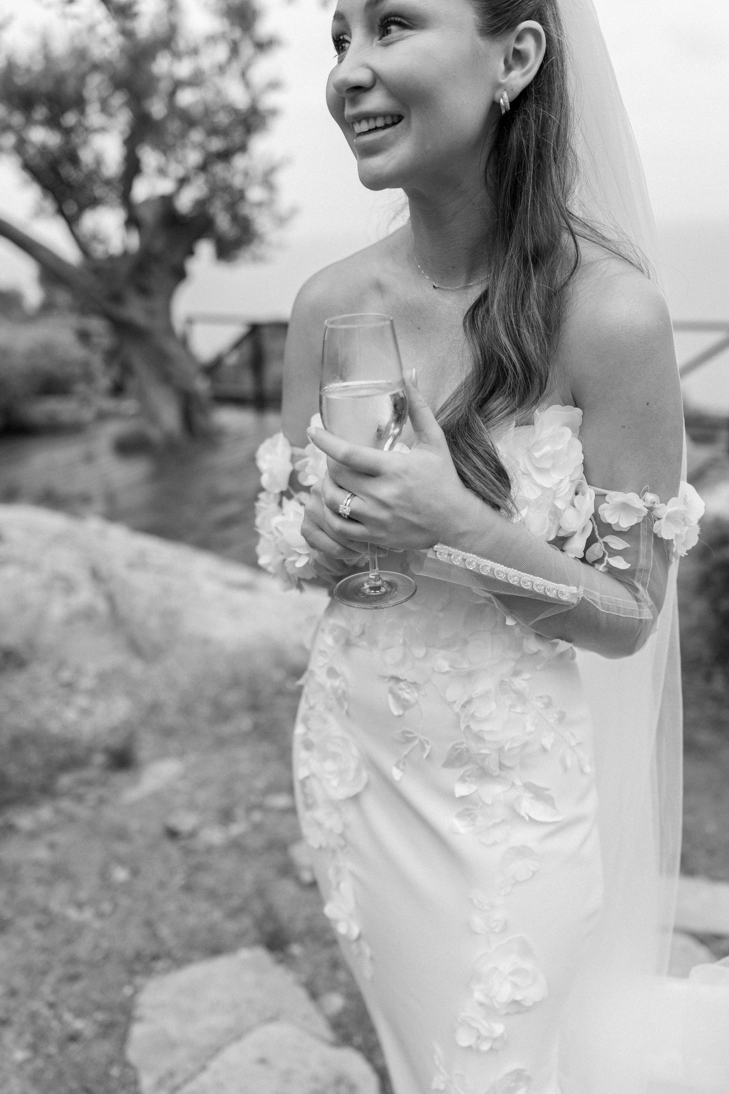 Black and white portrait series showing joyful moments in a wedding dress.