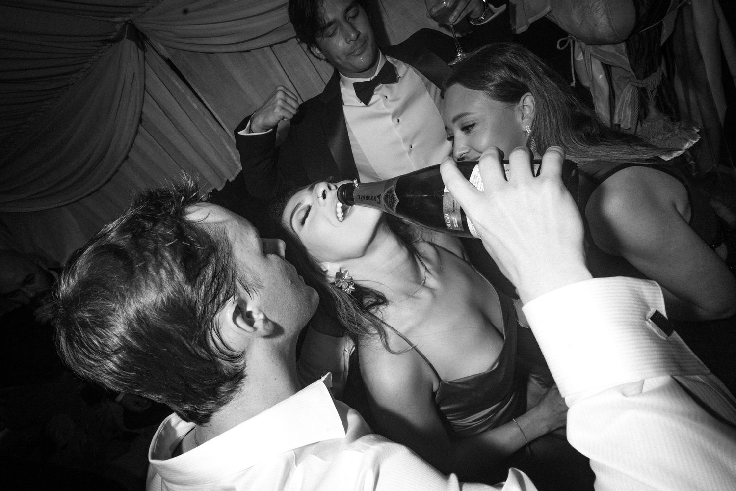 Black and white photo series showing couples kissing in various intimate poses and settings.