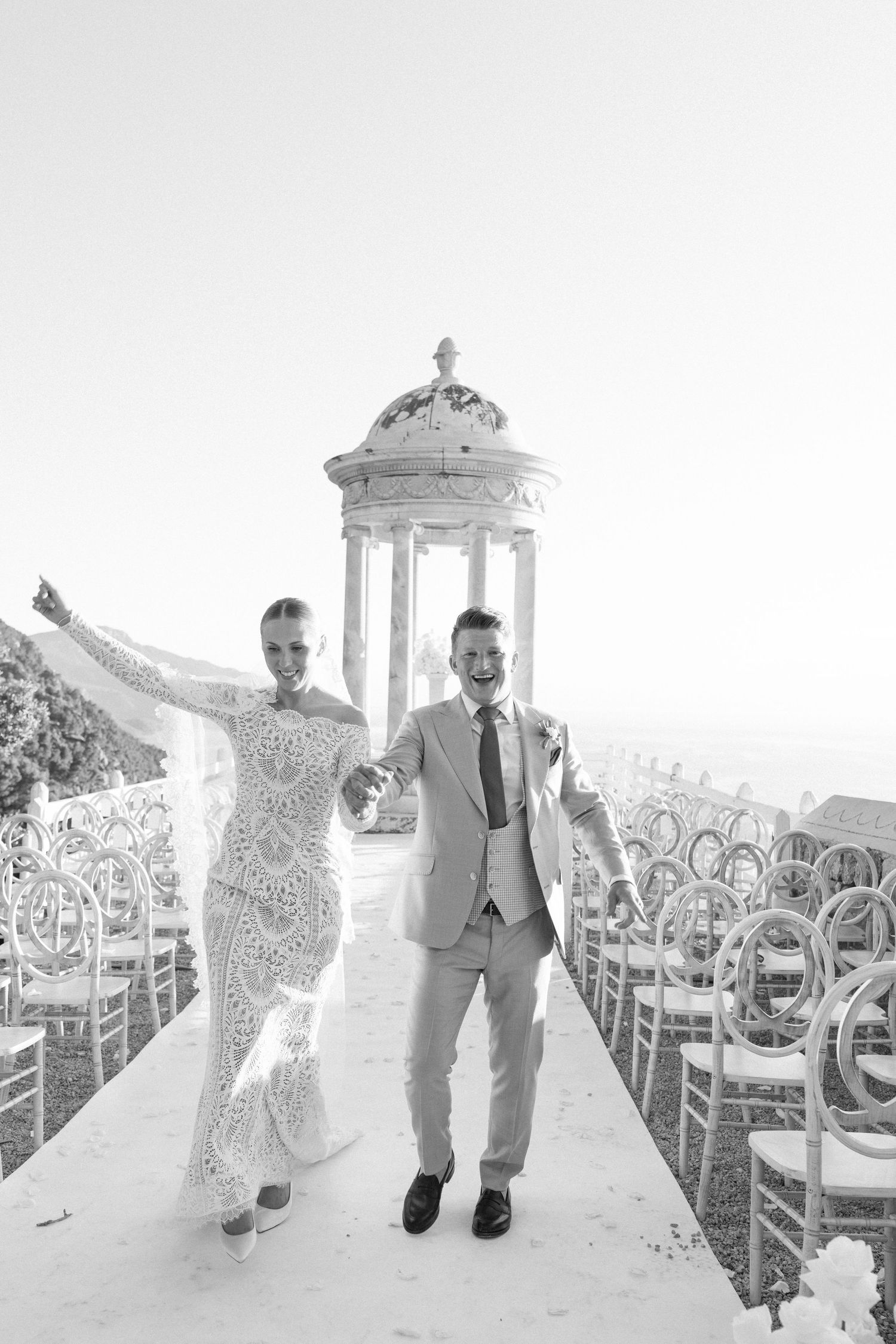 Celebratory wedding moments captured in elegant outdoor pavilion setting.