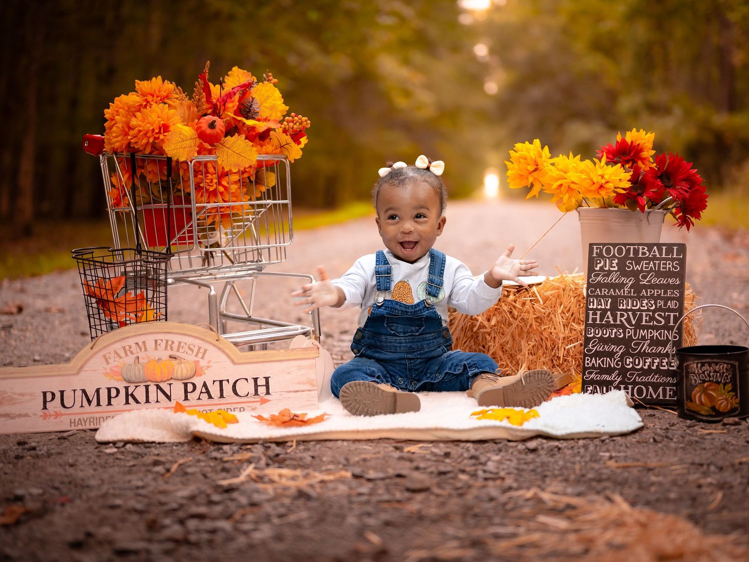 Baby girl sitting among pumpkins and orange flowers, Chesapeake VA fall photoshoot | Photography by Kylee Mason.