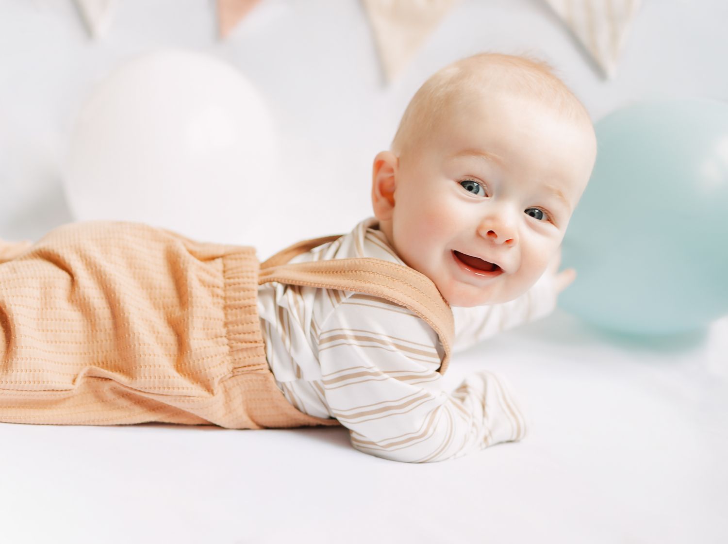 baby tummy time 6 months with balloons