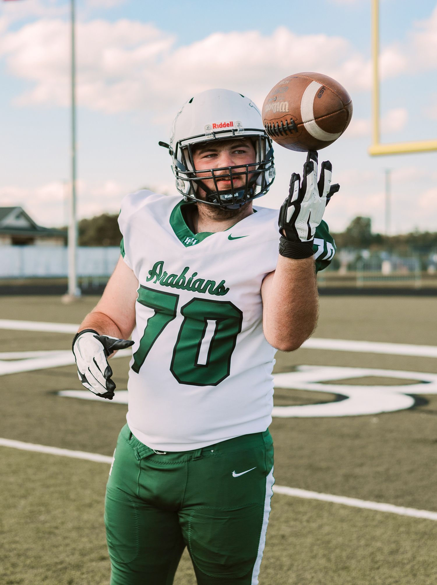 highs school football player in gear