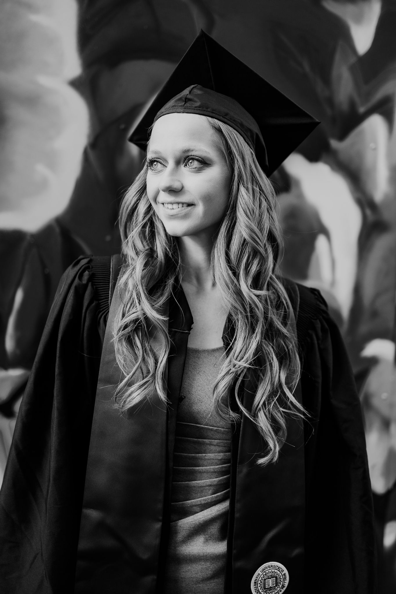 black and white photo of cap and gown session