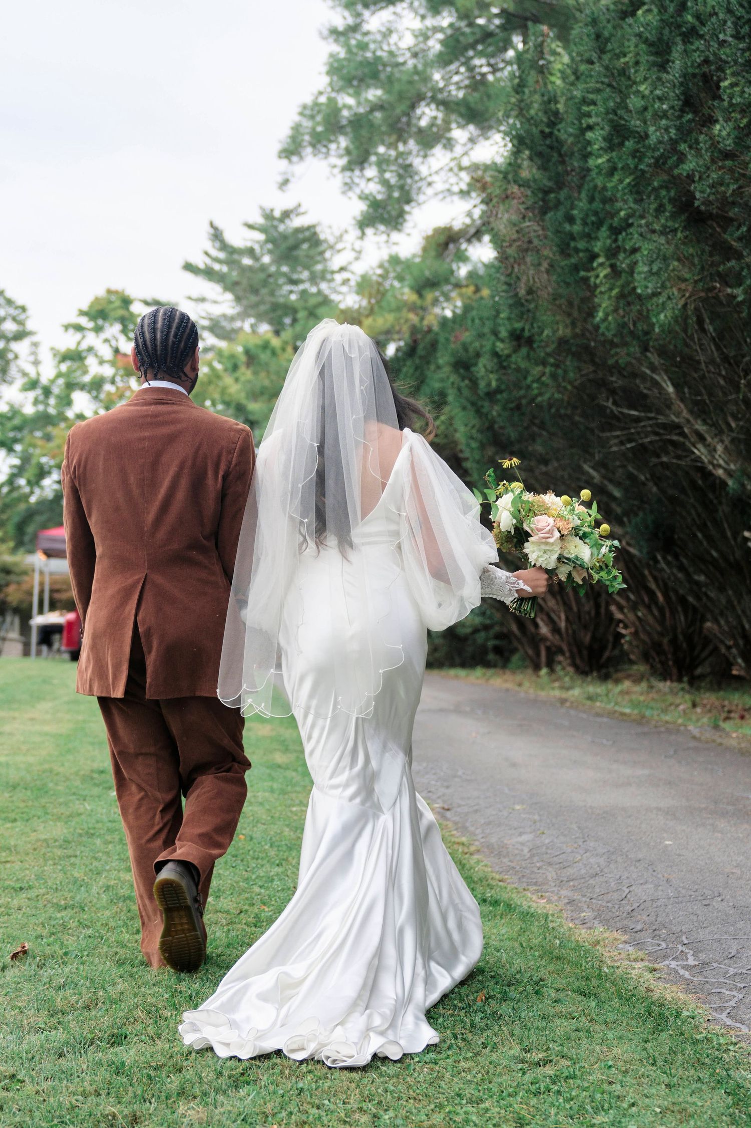 Bride and groom walking back to their seats after the wedding ceremony.