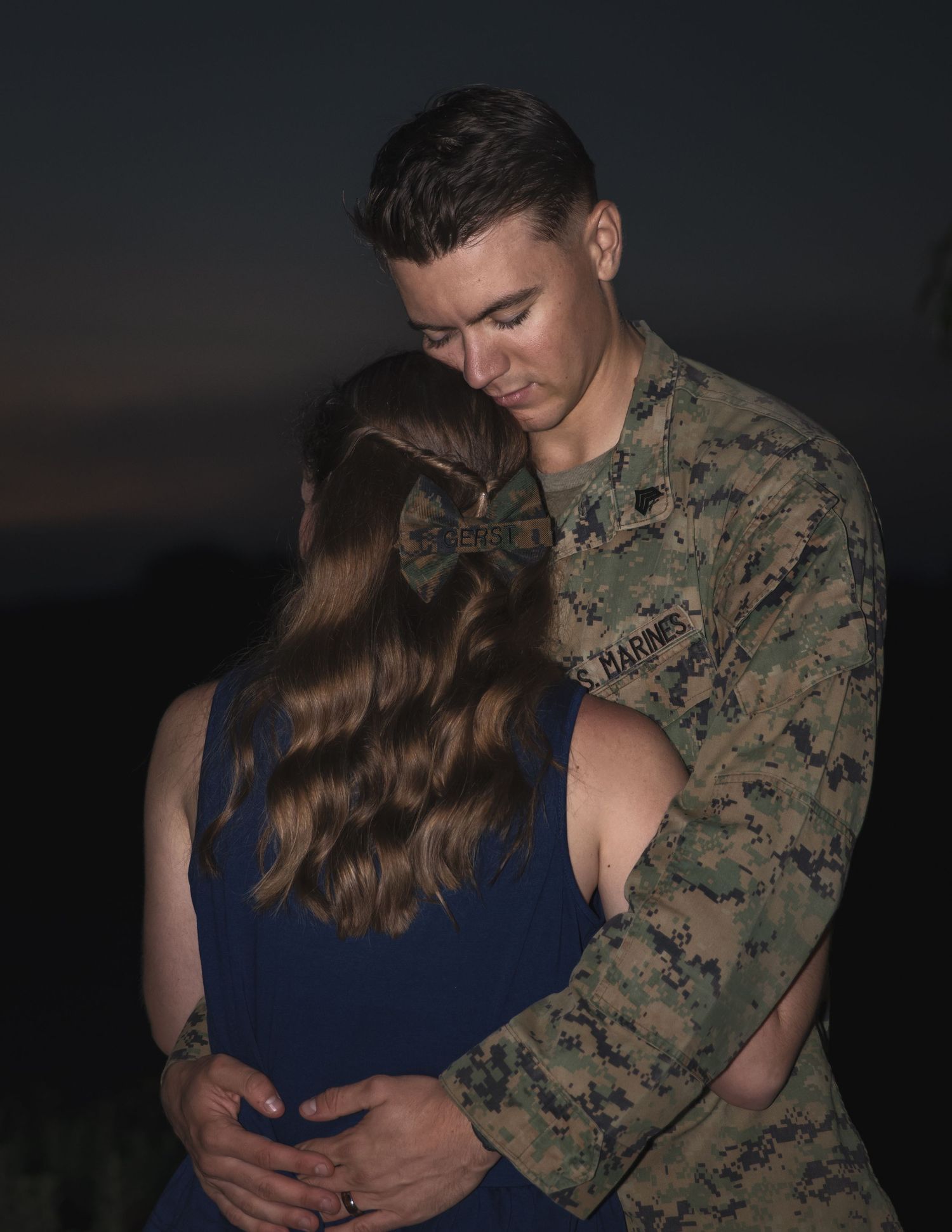 A series of intimate photos showing a couple embracing, with one person wearing military camouflage.