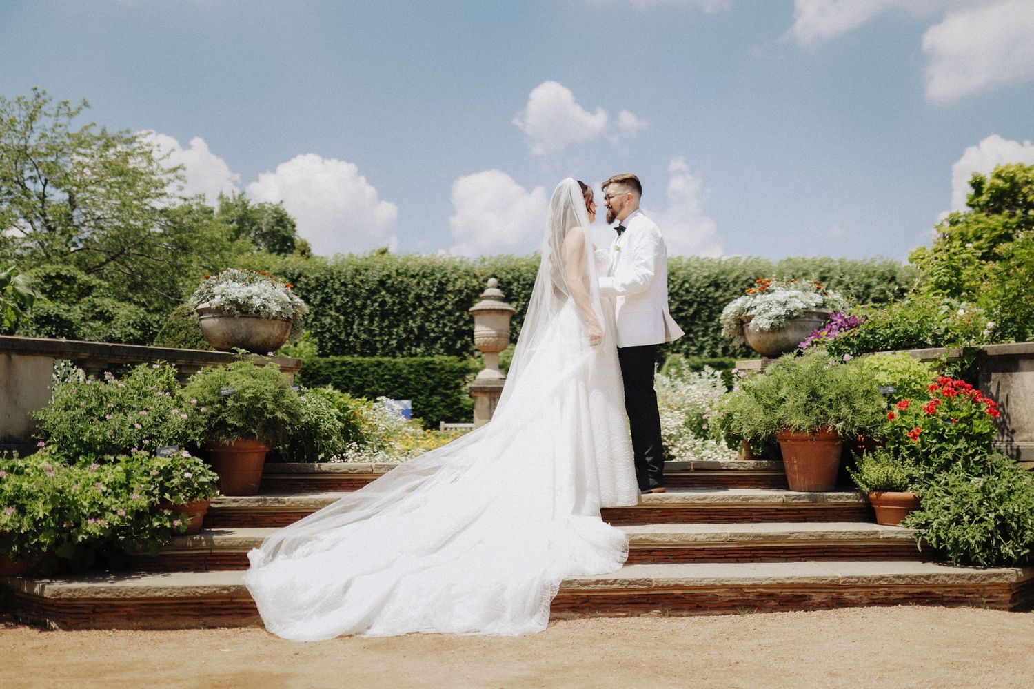 An elegant, film-inspired couple session at Chicago Botanic Garden with soft light, refined beauty, and timeless natural romance.