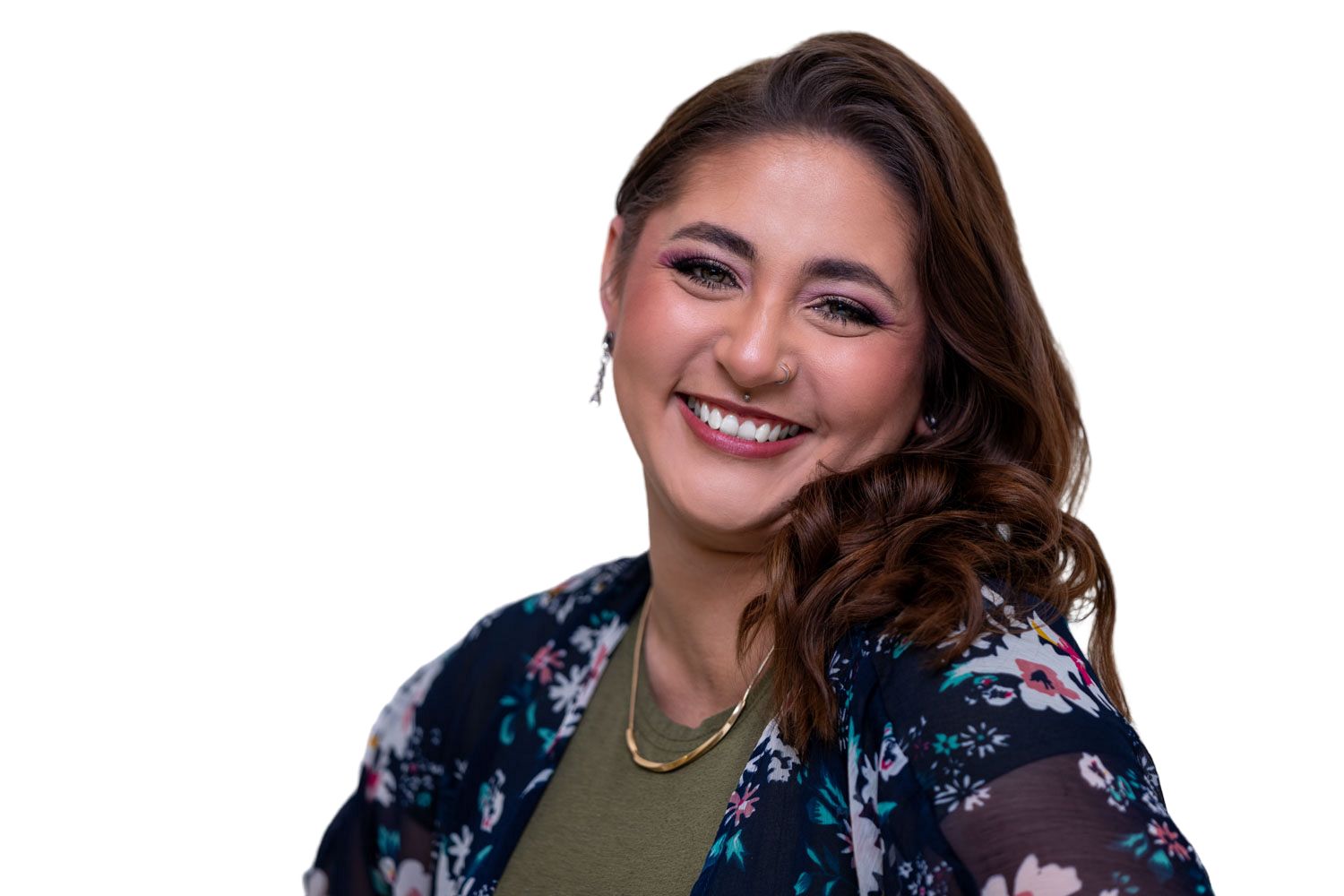 Cheerful young woman in floral kimono jacket smiling brightly against white background.