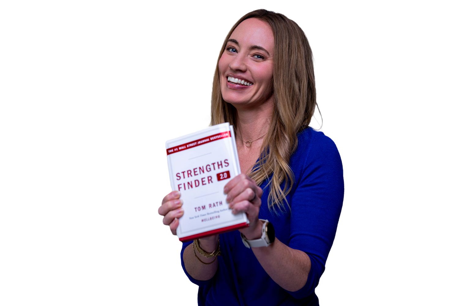 Smiling blonde woman in blue top holding a StrengthsFinder 2.0 book against white background.