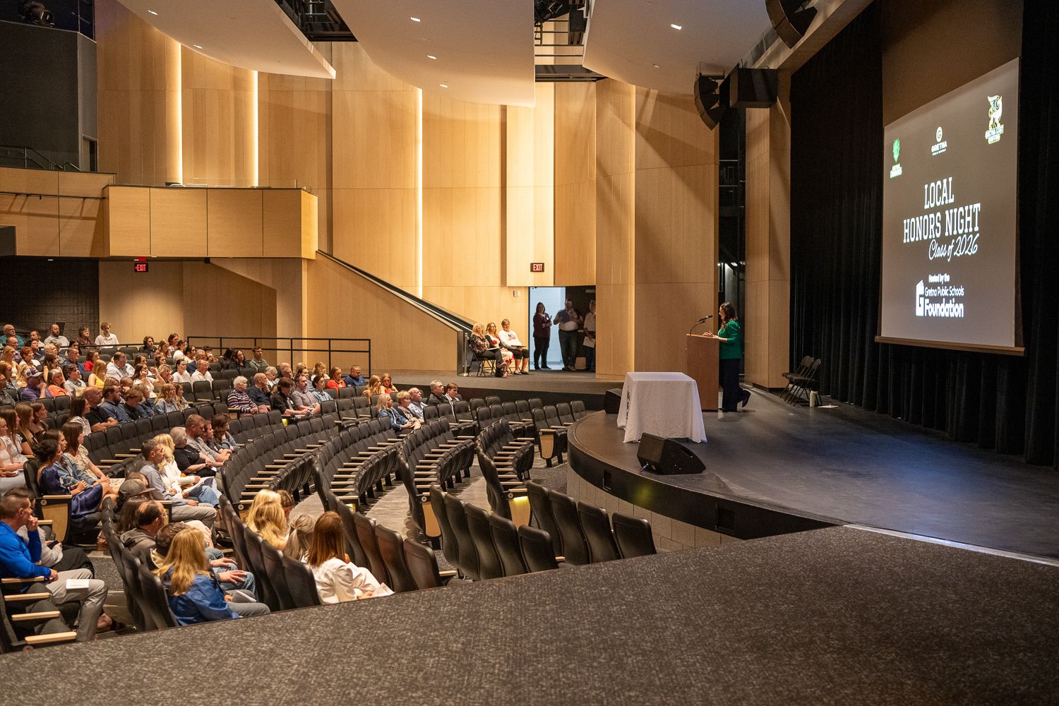 Large auditorium filled with attendees at the Gretna Public Schools Foundation Scholarship Awards ceremony in 2026.