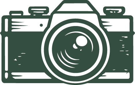 Dark green vintage camera silhouette illustration on a white background.